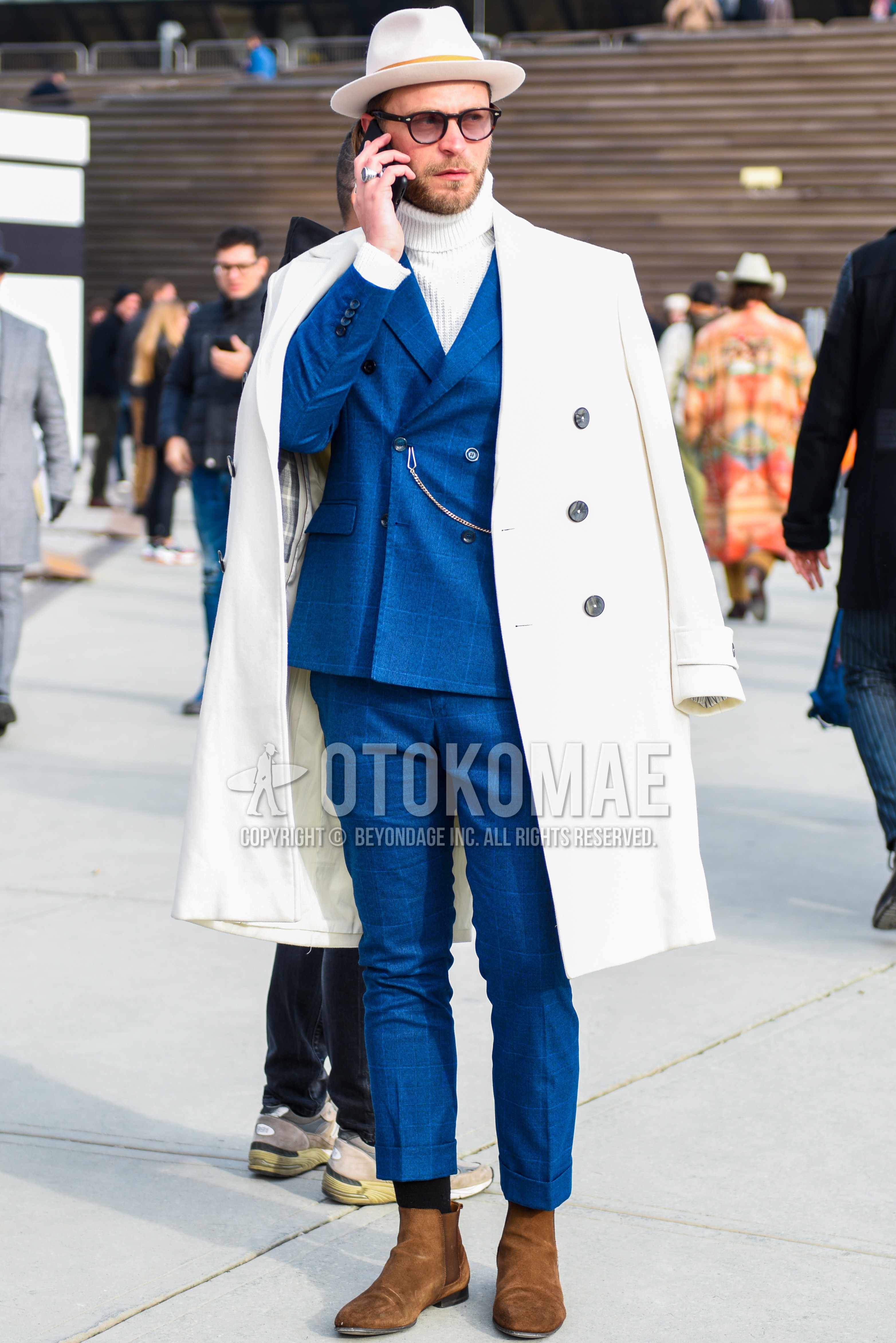 Men's autumn winter outfit with white plain hat, black plain sunglasses, white plain chester coat, white plain turtleneck knit, black plain socks, brown side-gore boots, blue check suit.