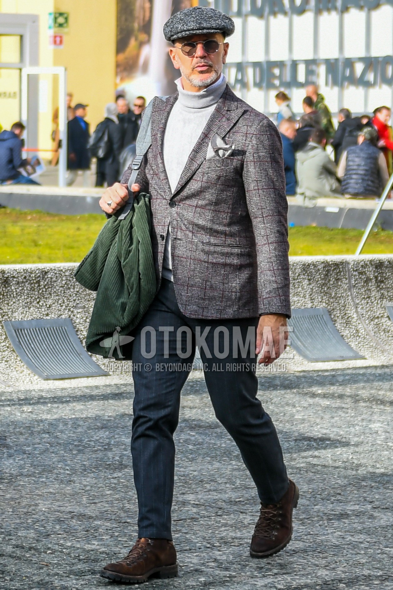 Men's autumn winter outfit with gray plain cap, plain sunglasses, gray check tailored jacket, gray plain turtleneck knit, dark gray plain slacks, brown  boots.