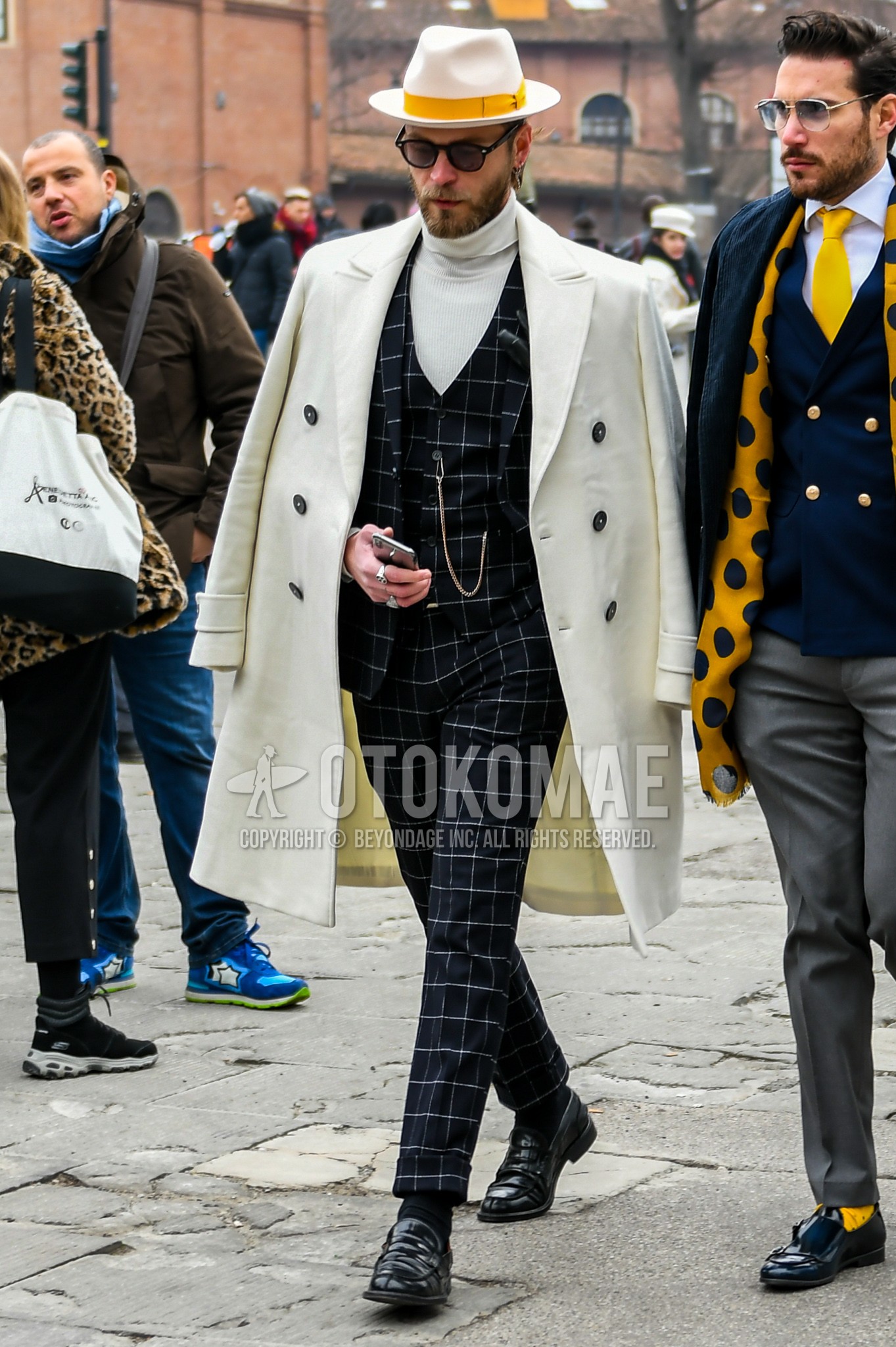 Men's winter outfit with white plain hat, white plain chester coat, white plain turtleneck knit, black plain socks, black coin loafers leather shoes, black check three-piece suit.