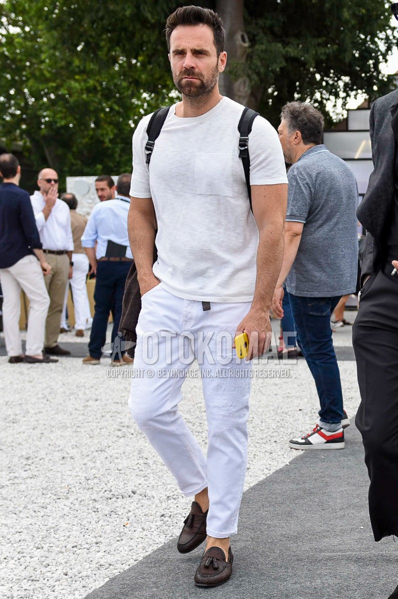 Men's summer outfit with white plain t-shirt, white plain damaged jeans, brown tassel loafers leather shoes.