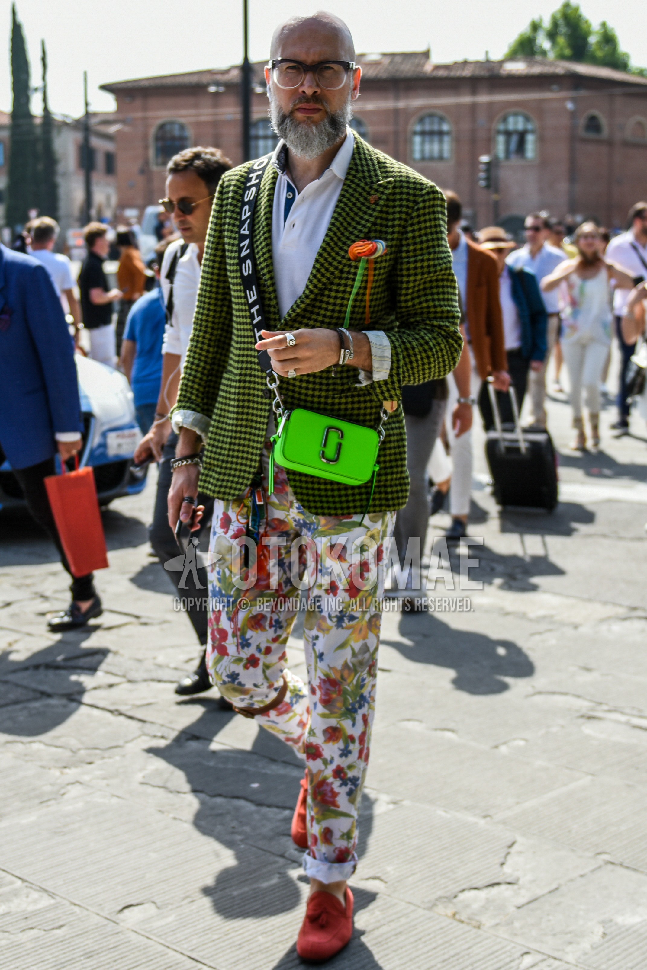 Men's spring summer autumn outfit with black plain glasses, green check tailored jacket, white plain polo shirt, multi-color white plain cotton pants, red tassel loafers leather shoes, green plain succoshe.