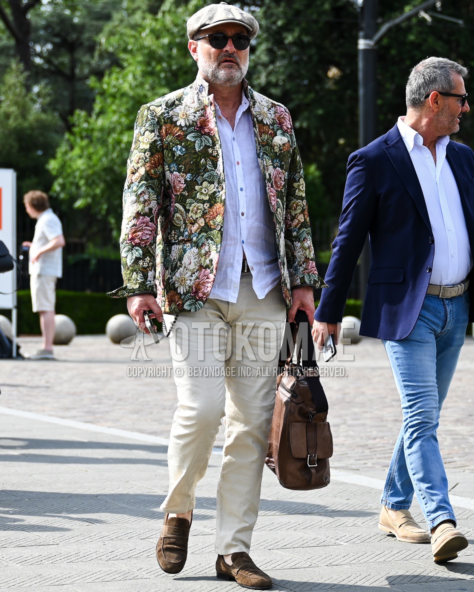 Men's spring summer autumn outfit with white plain hunting cap, green whole pattern tailored jacket, white plain shirt, beige plain denim/jeans, brown coin loafers leather shoes, brown suede shoes leather shoes, brown plain boston bag.