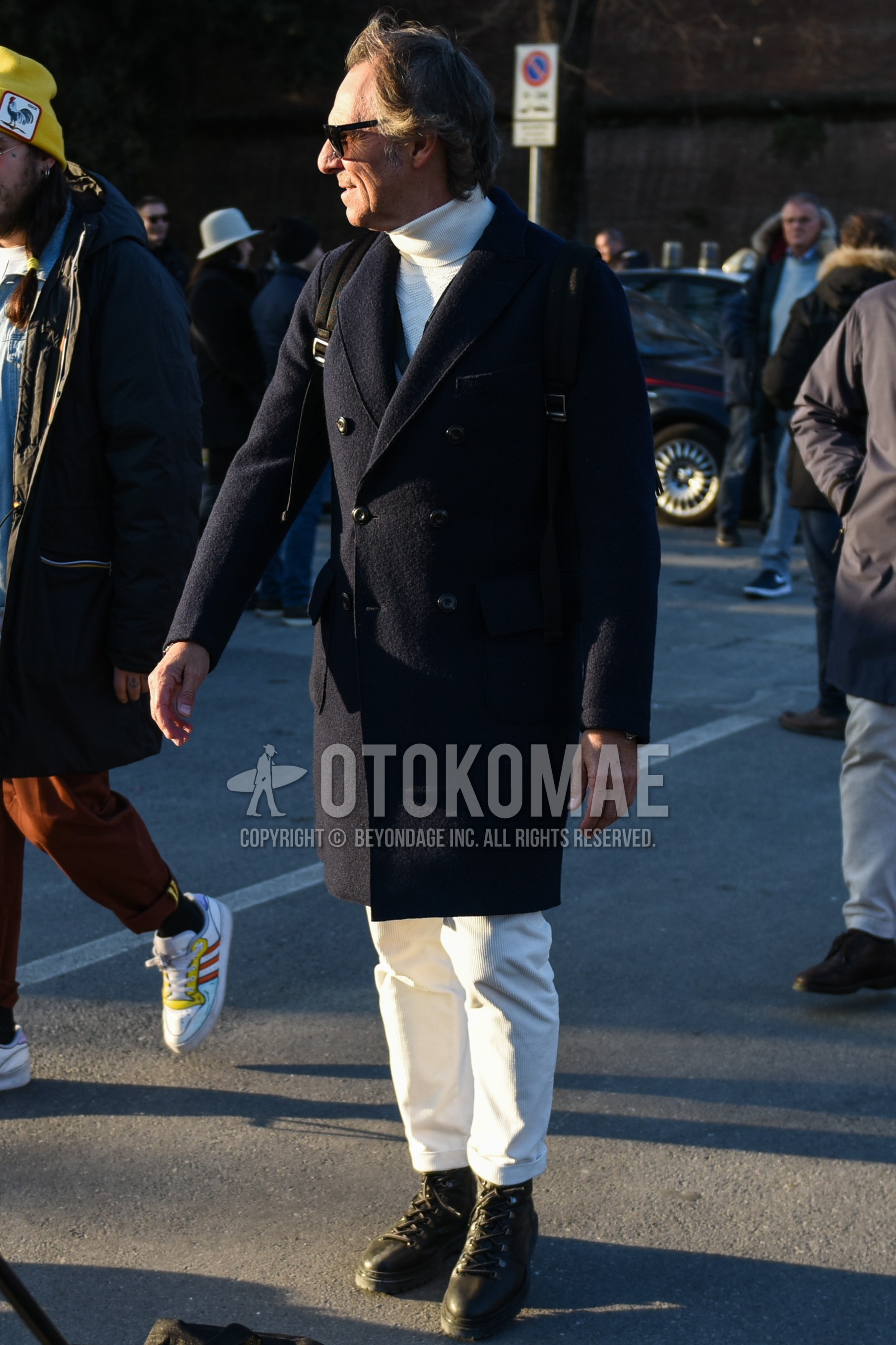 Men's autumn winter outfit with black plain sunglasses, black plain chester coat, white plain turtleneck knit, white plain winter pants (corduroy,velour), black  boots.