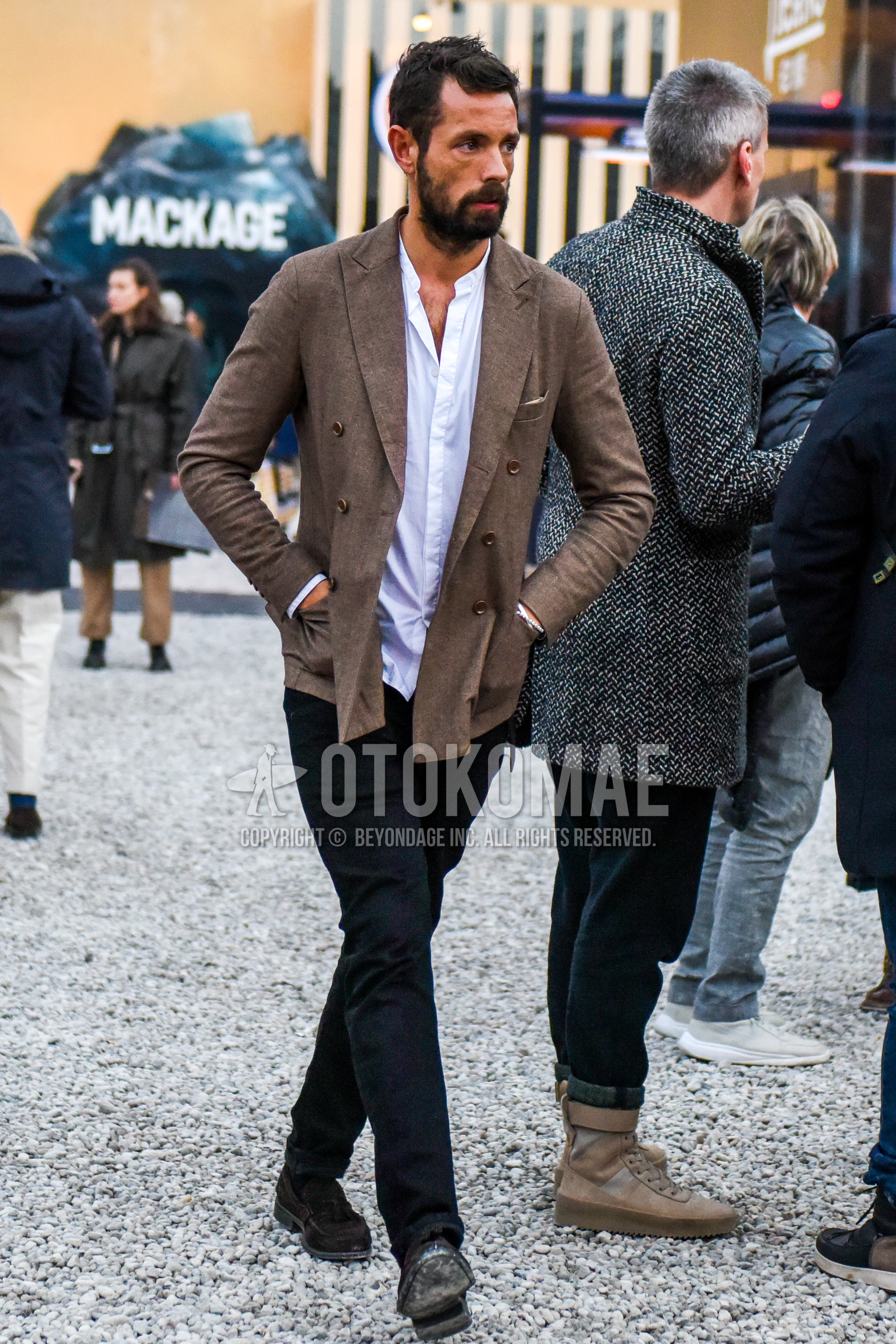 Men's winter outfit with brown plain tailored jacket, white plain shirt, black plain cotton pants, brown coin loafers leather shoes.