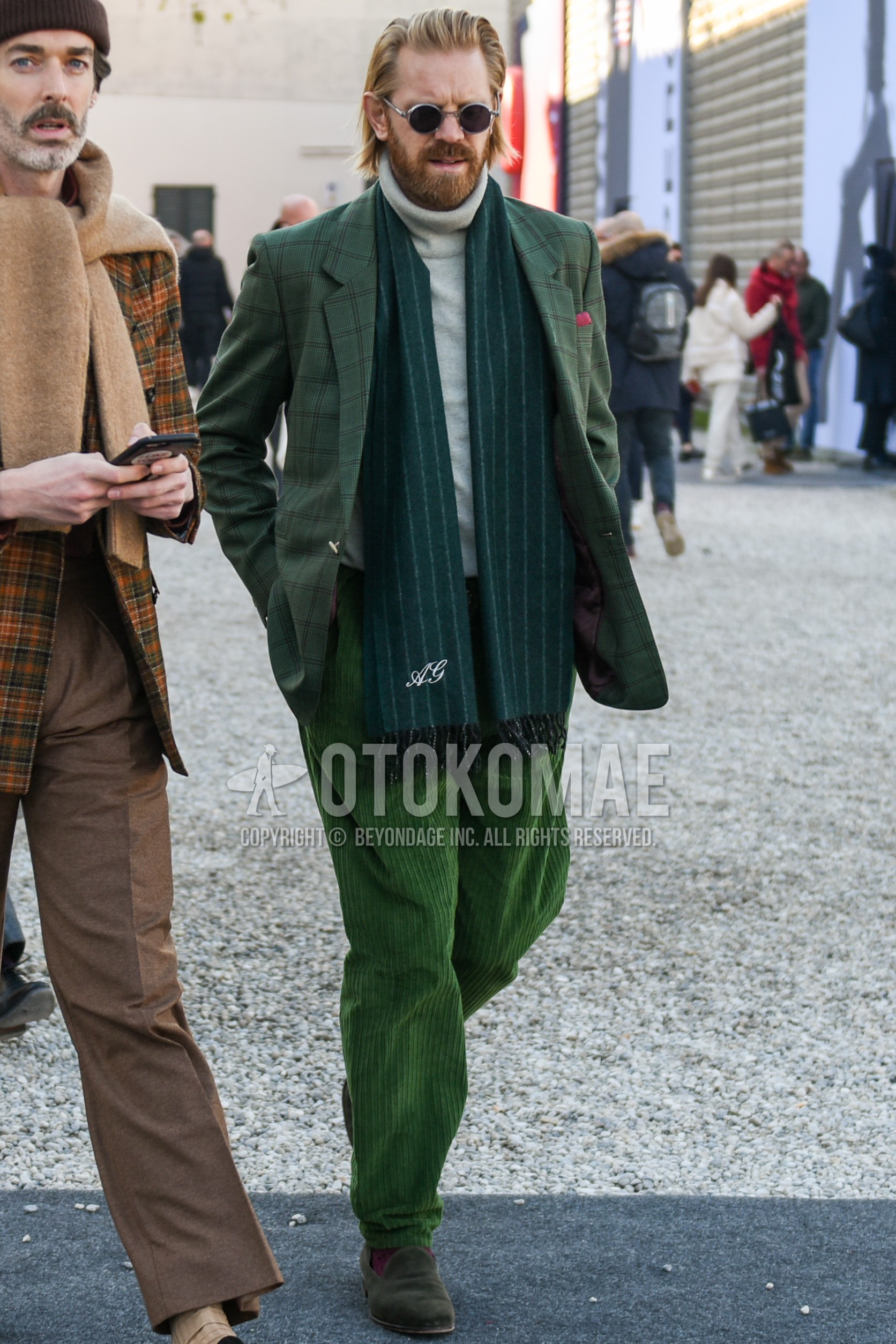 Men's autumn winter outfit with silver plain sunglasses, green stripes scarf, green check tailored jacket, white plain turtleneck knit, green plain winter pants (corduroy,velour), brown plain socks, green  loafers leather shoes.