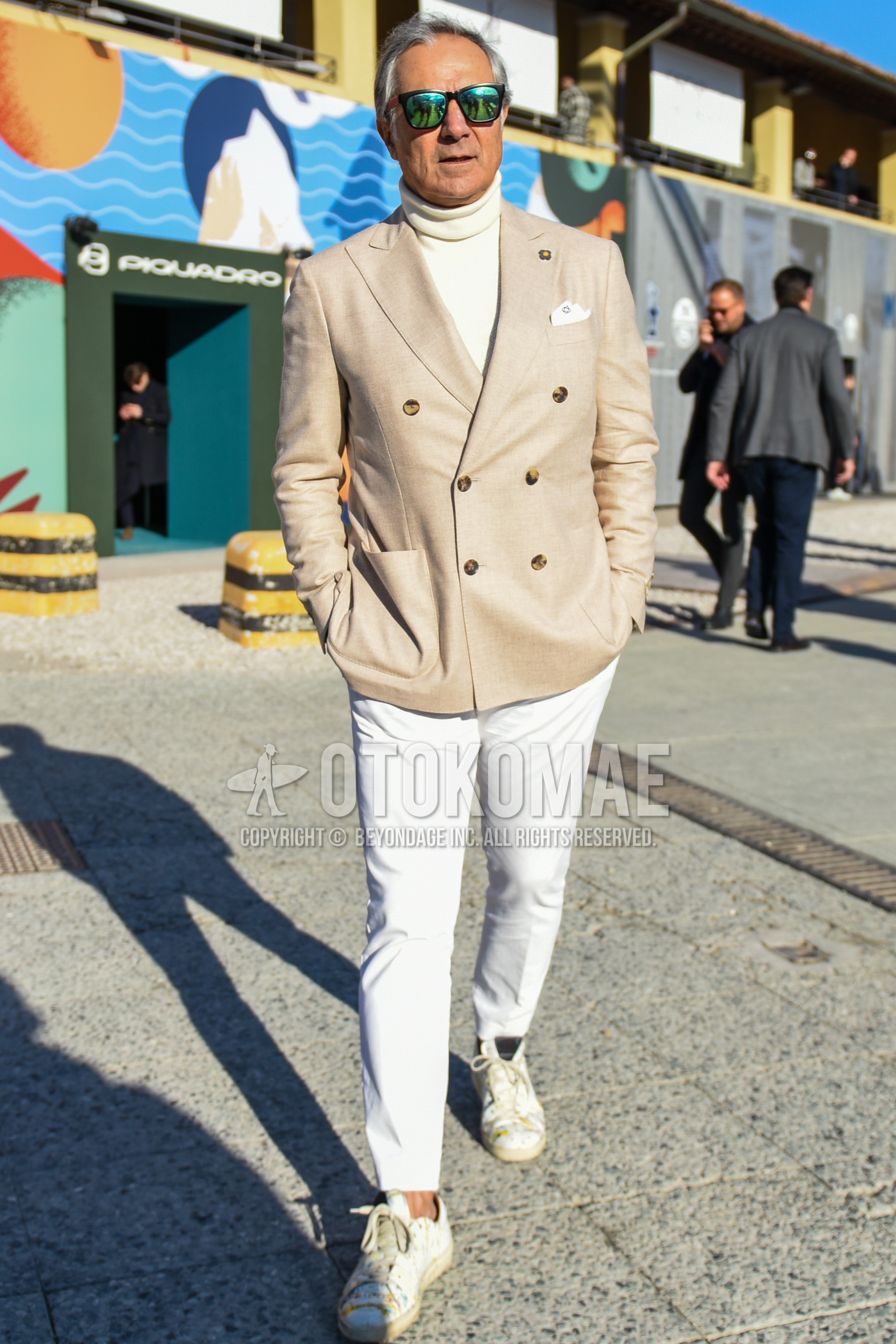 Men's spring autumn outfit with black plain sunglasses, beige plain tailored jacket, white plain turtleneck knit, white plain cotton pants, white plain ankle pants, white low-cut sneakers.