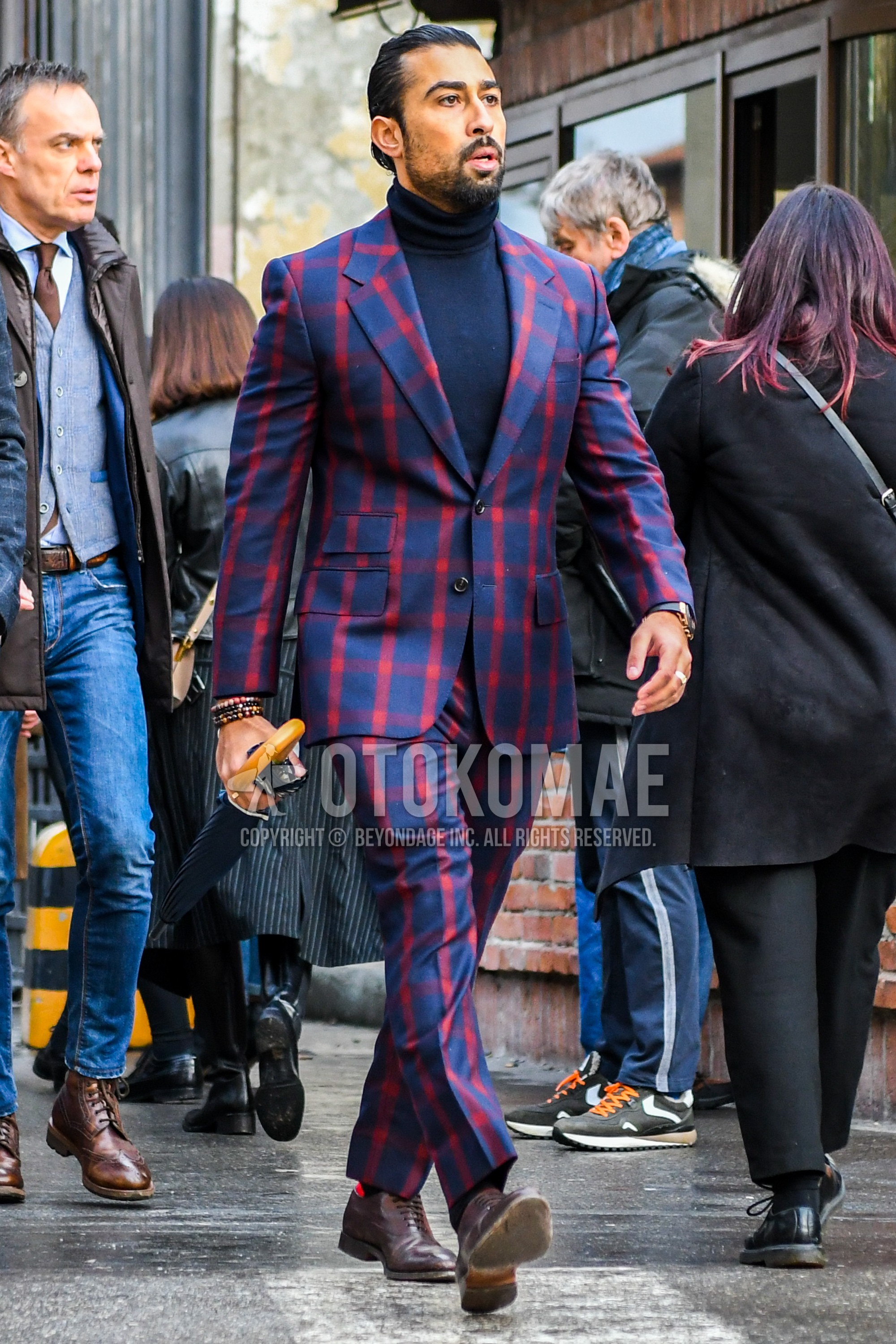 Men's winter outfit with navy plain turtleneck knit, brown plain toe leather shoes, navy red check suit.