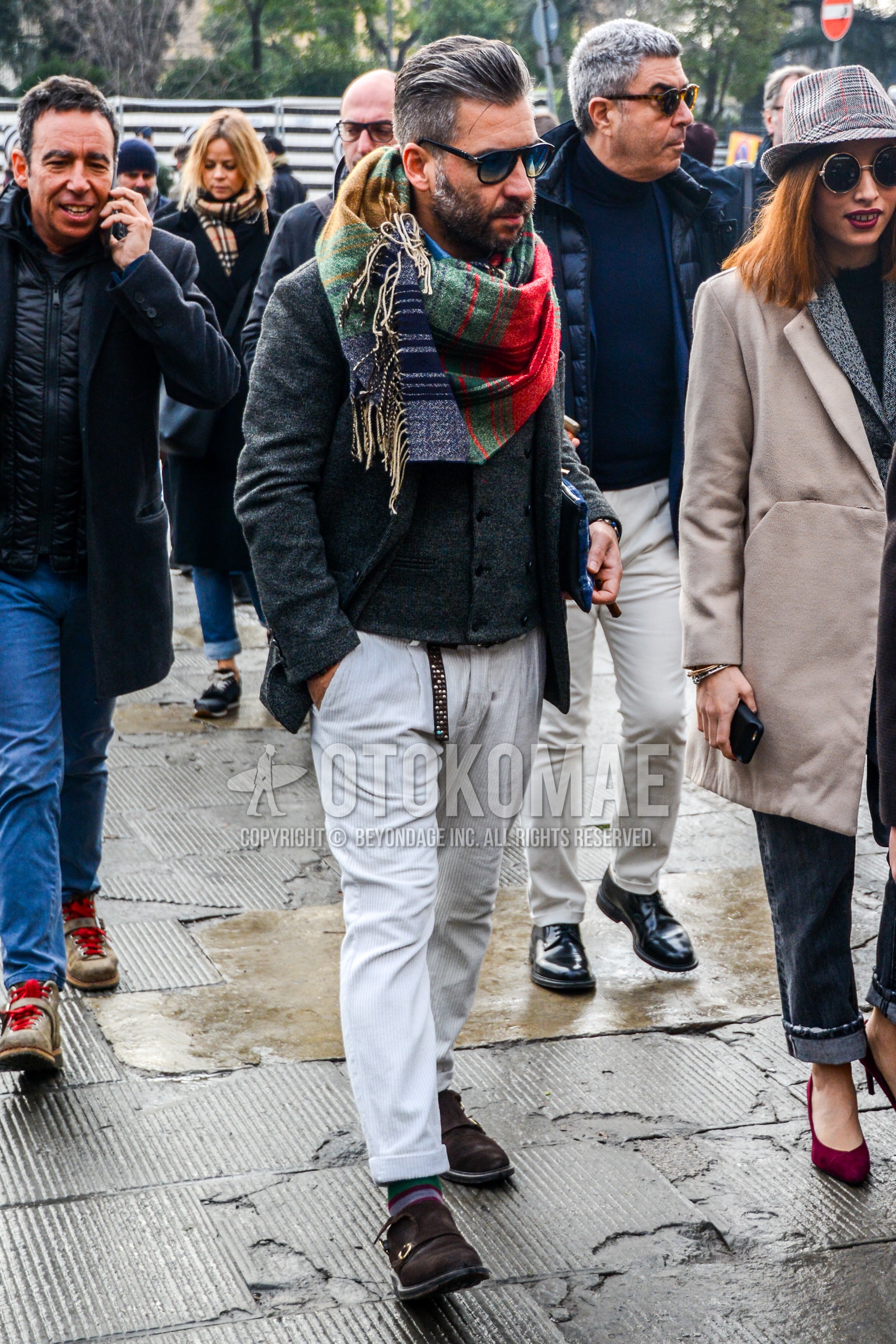 Men's autumn winter outfit with multi-color scarf scarf, gray plain chester coat, gray plain gilet, white plain cotton pants, multi-color horizontal stripes socks, brown monk shoes leather shoes, suede shoes leather shoes.