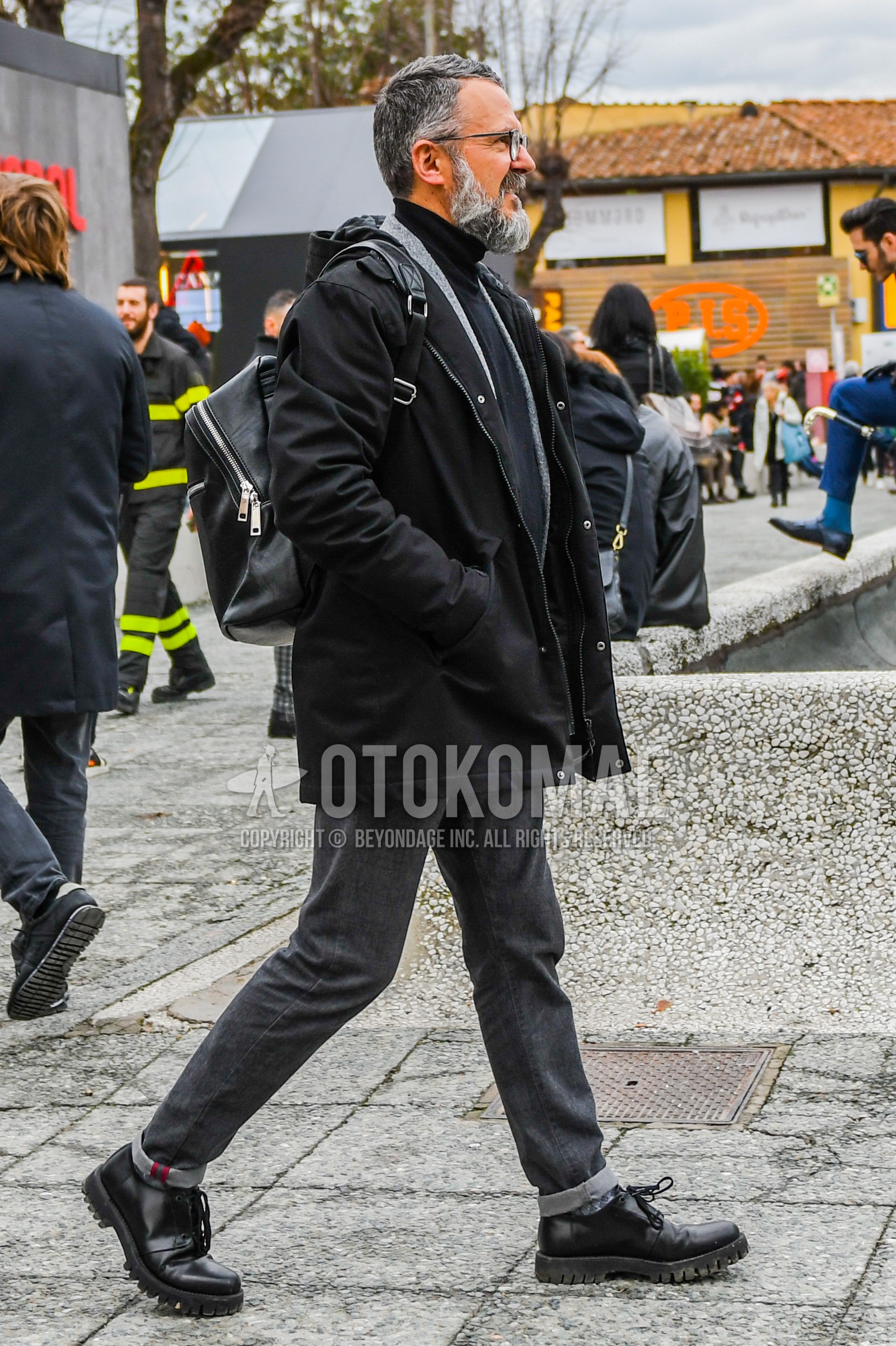 Men's winter outfit with plain glasses, black plain hooded coat, black plain turtleneck knit, dark gray plain denim/jeans, black plain toe leather shoes.