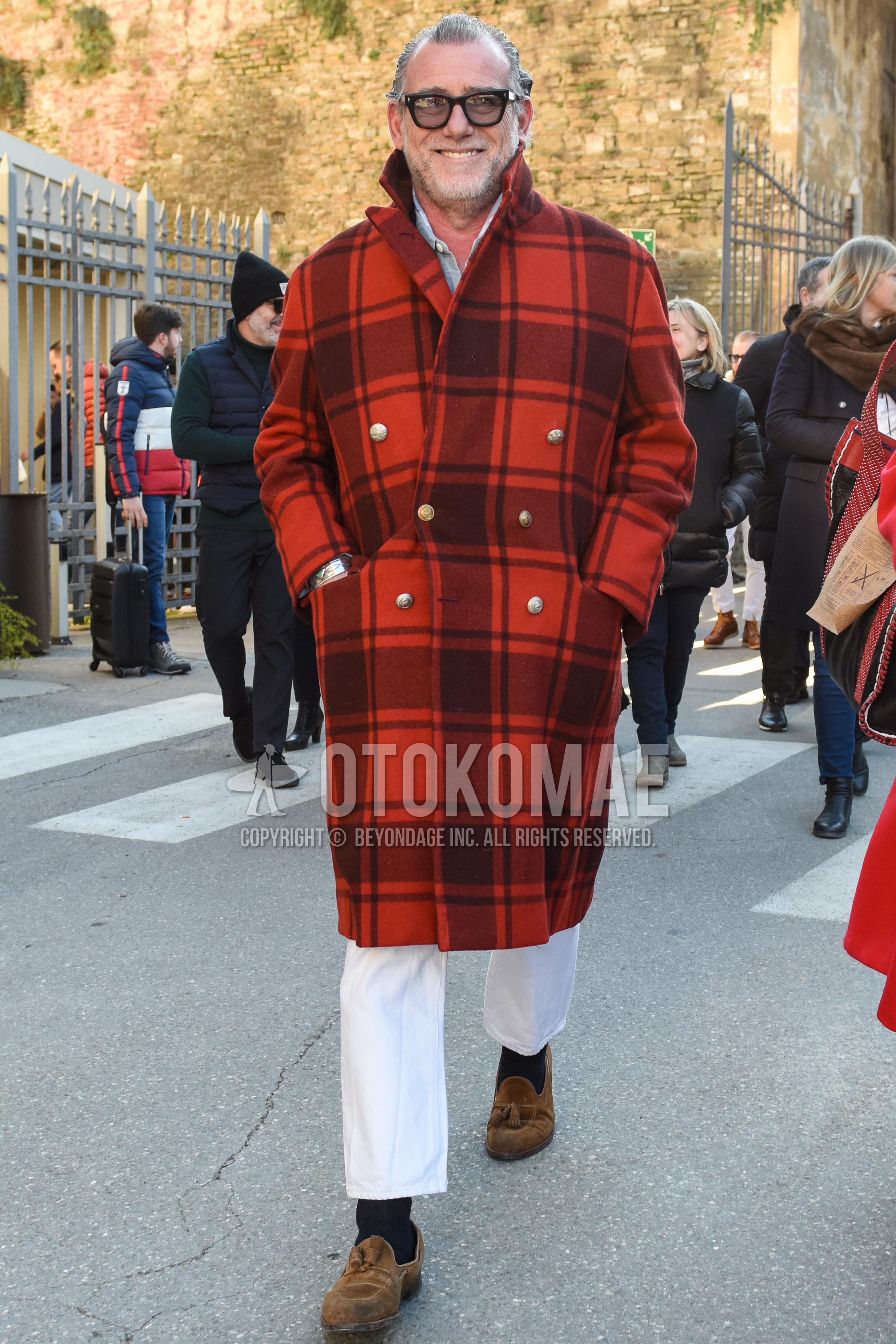 Men's autumn winter outfit with black plain sunglasses, red check chester coat, white plain cotton pants, white plain cropped pants, black plain socks, beige tassel loafers leather shoes.