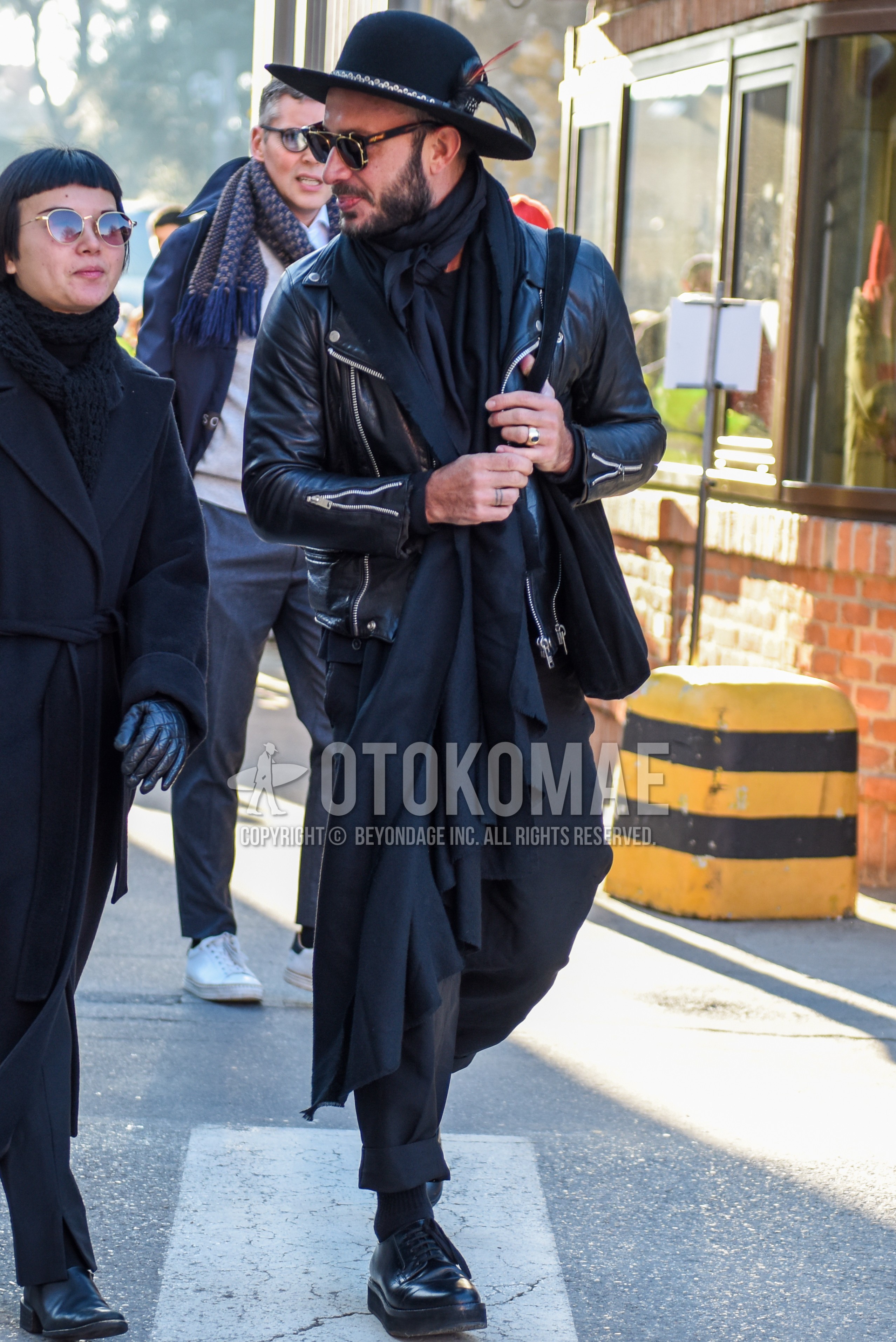 Men's autumn winter outfit with navy plain hat, black plain sunglasses, gray plain scarf, black plain riders jacket, gray plain slacks, dark gray plain socks, black straight-tip shoes leather shoes.