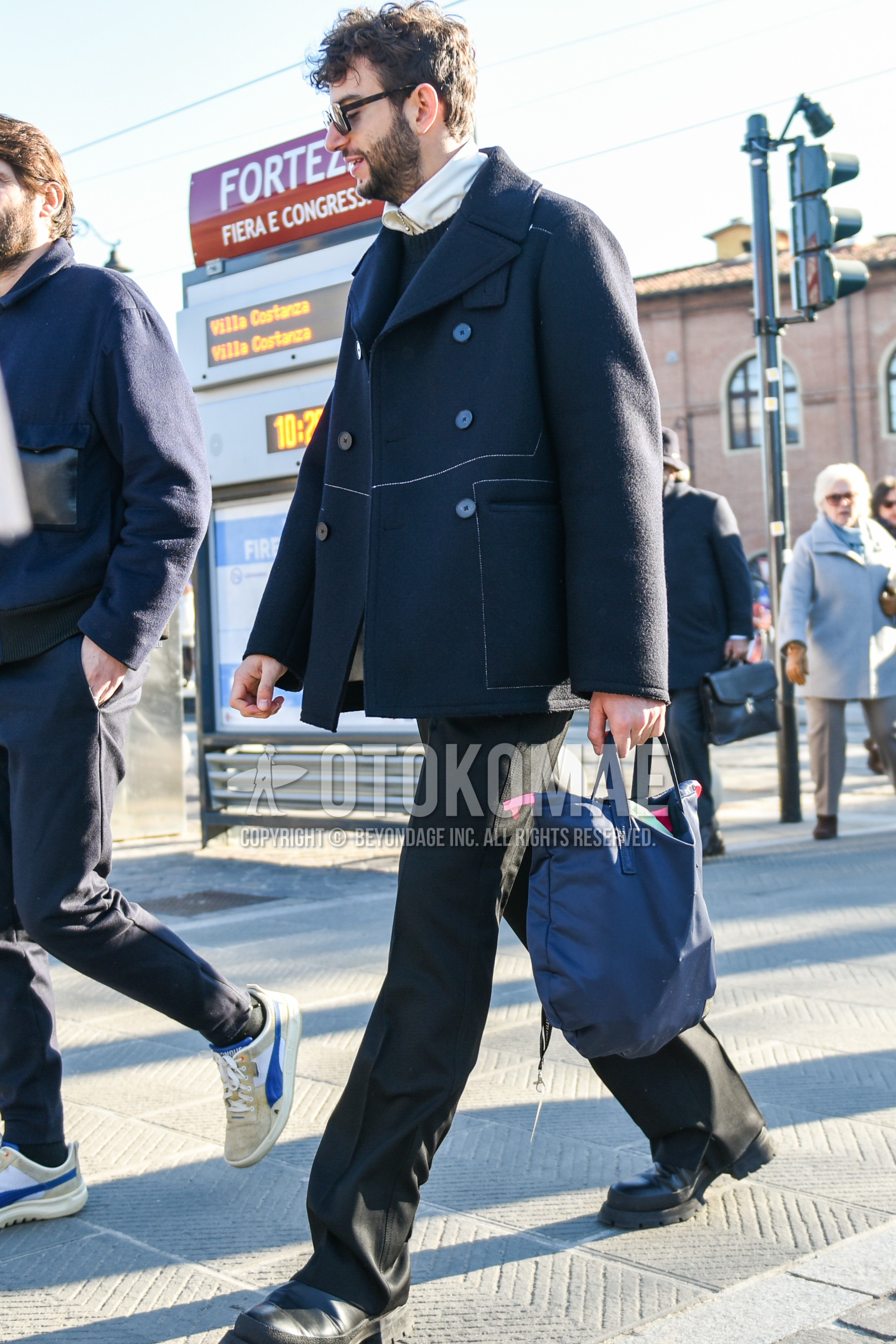 Men's autumn winter outfit with black plain sunglasses, navy plain p coat, dark gray plain sweater, white plain shirt, black plain denim/jeans, black  boots, gray plain briefcase/handbag.