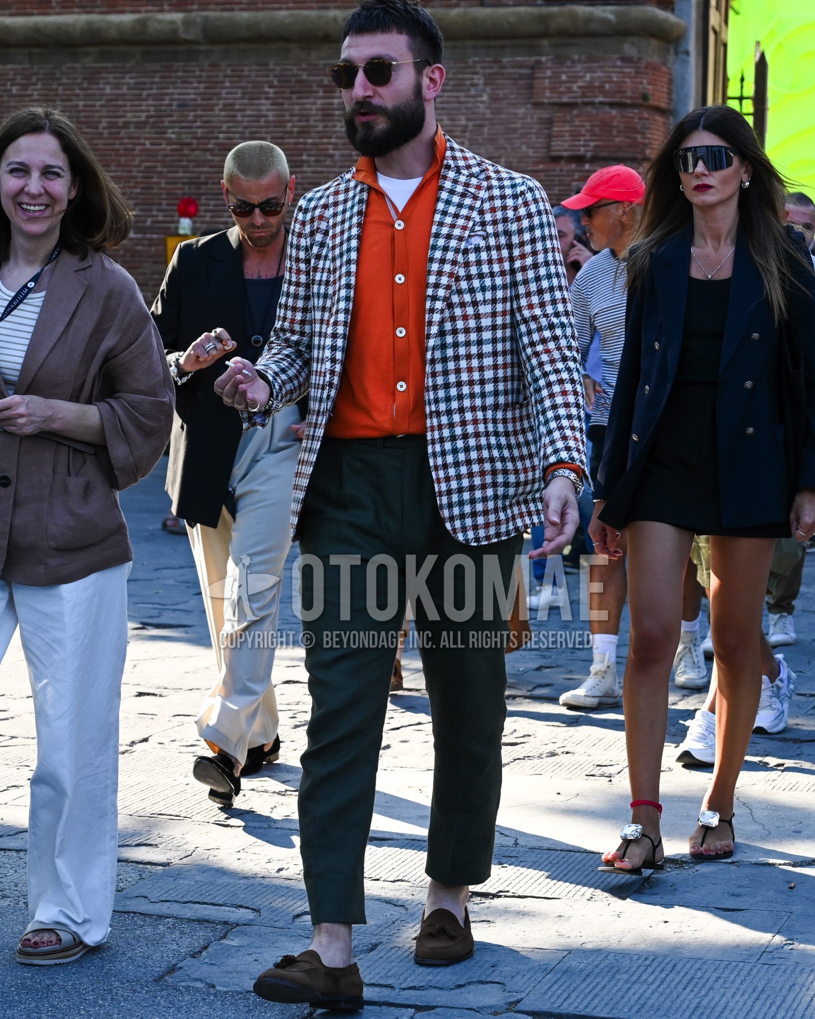 Men's spring summer autumn outfit with black plain sunglasses, white blue red check tailored jacket, red plain cardigan, white plain t-shirt, navy plain beltless pants, brown tassel loafers leather shoes.