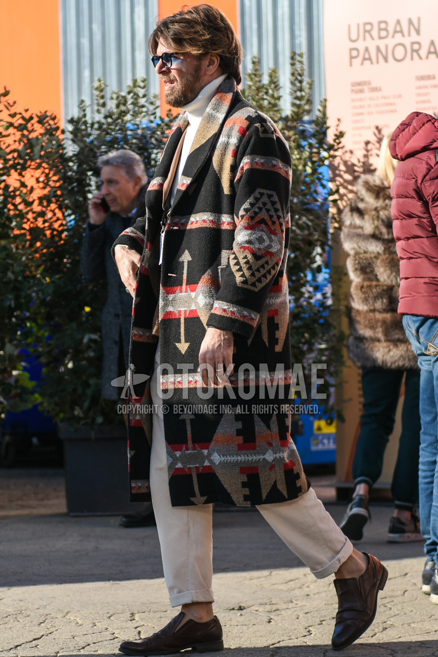 Men's autumn winter outfit with black plain sunglasses, multi-color outerwear shawl collar coat, white plain turtleneck knit, white plain cotton pants, brown  loafers leather shoes.