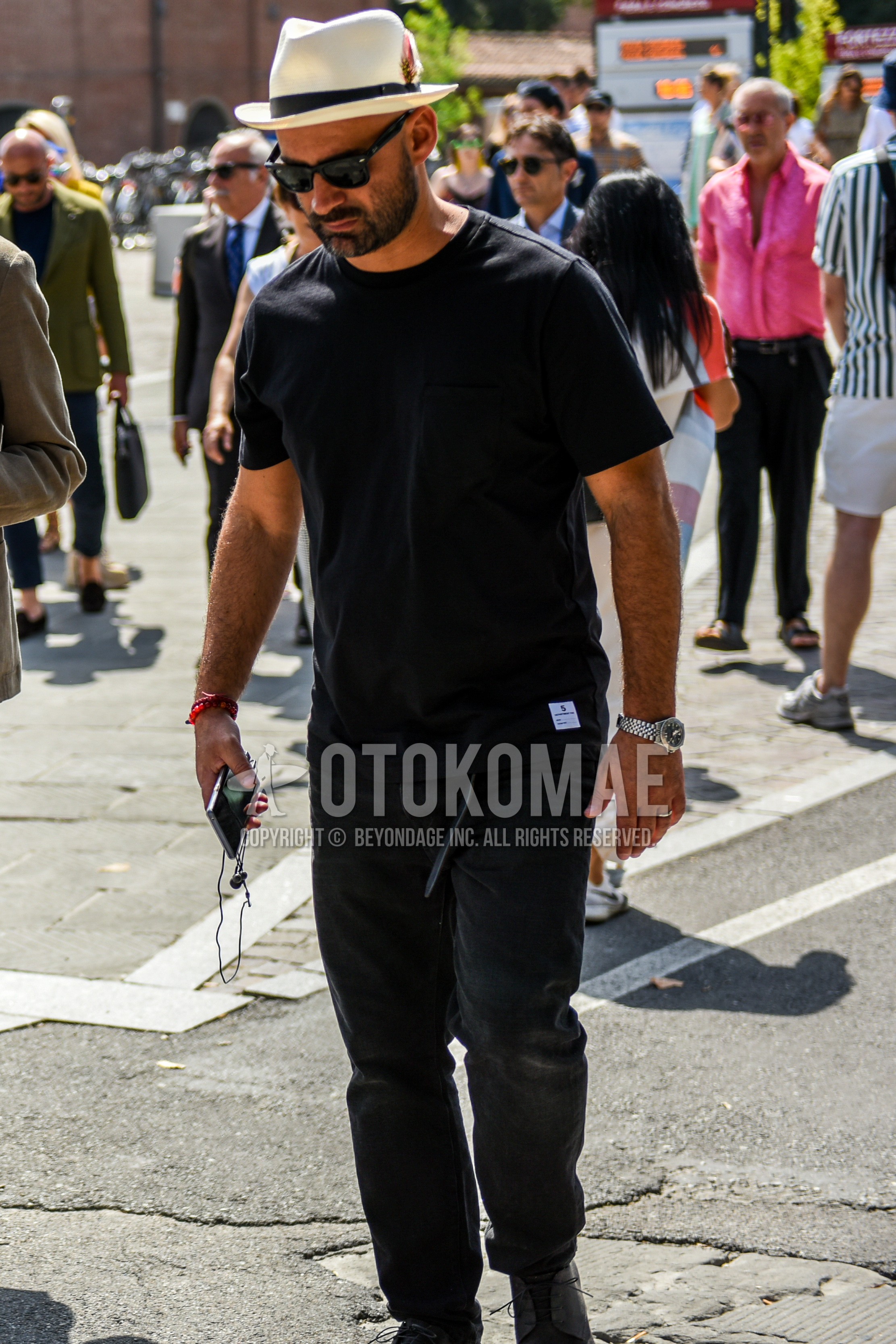 Men's summer outfit with white plain hat, black plain sunglasses, black plain t-shirt, black plain denim/jeans.