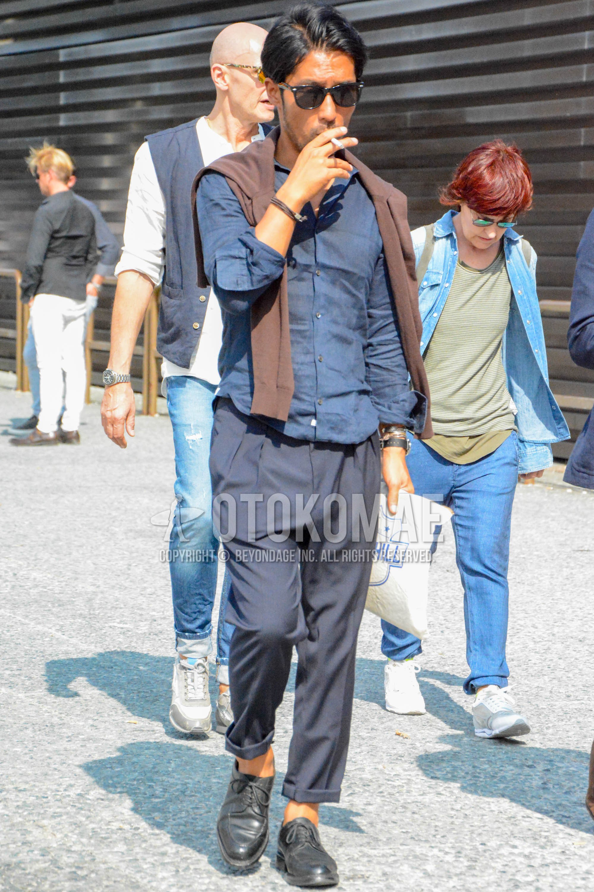 Men's spring summer outfit with black plain sunglasses, navy plain shirt, navy plain slacks, navy plain pleated pants, black u-tip shoes leather shoes.