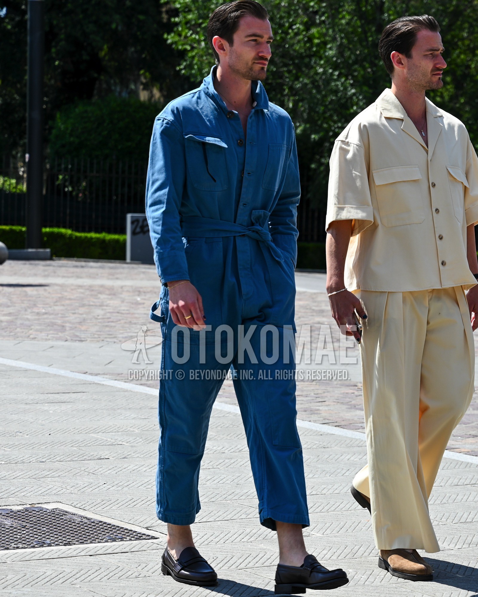 Men's spring summer autumn outfit with black coin loafers leather shoes, blue plain casual setup.