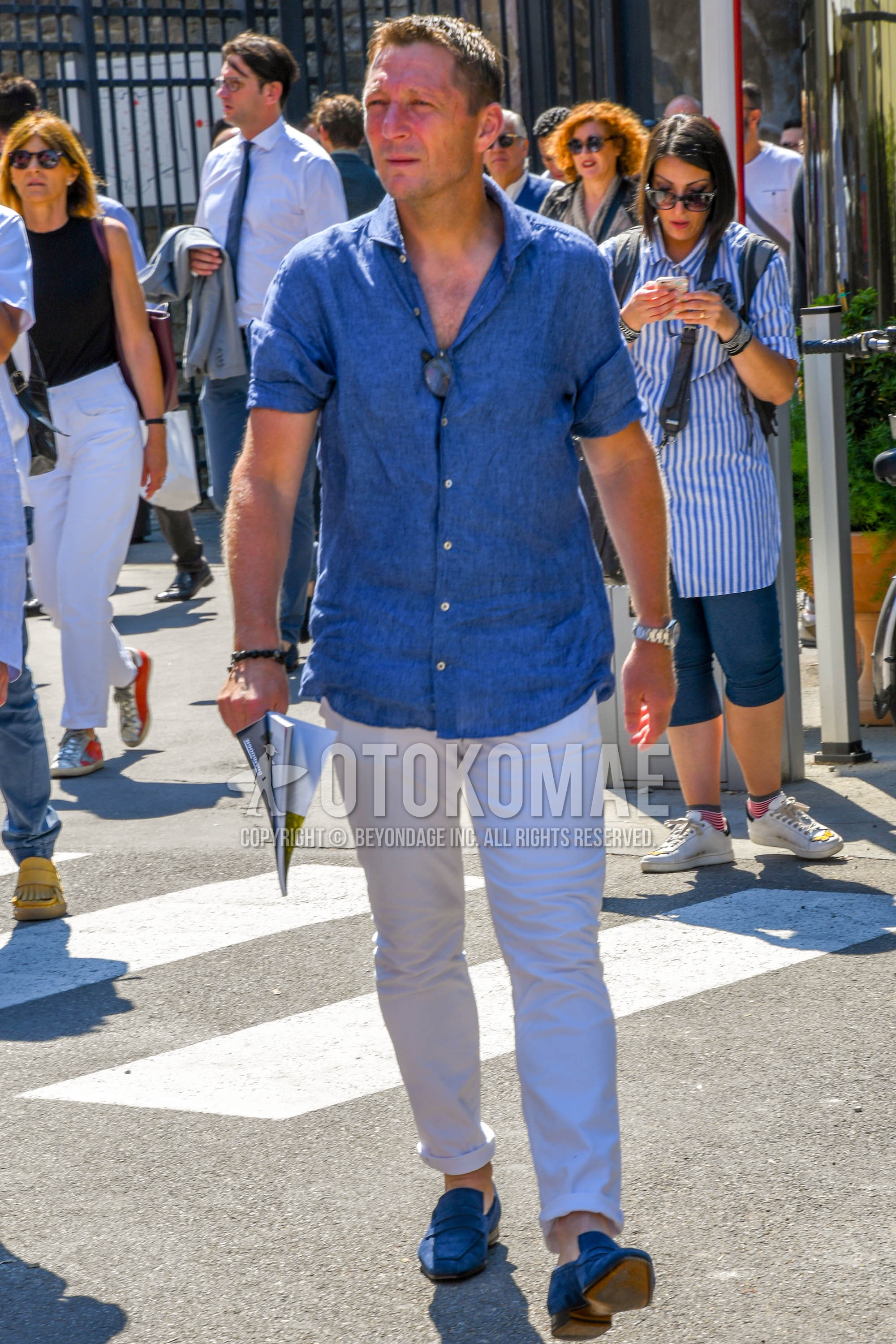 Men's spring summer outfit with light blue plain shirt, white plain denim/jeans, blue coin loafers leather shoes, suede shoes leather shoes.