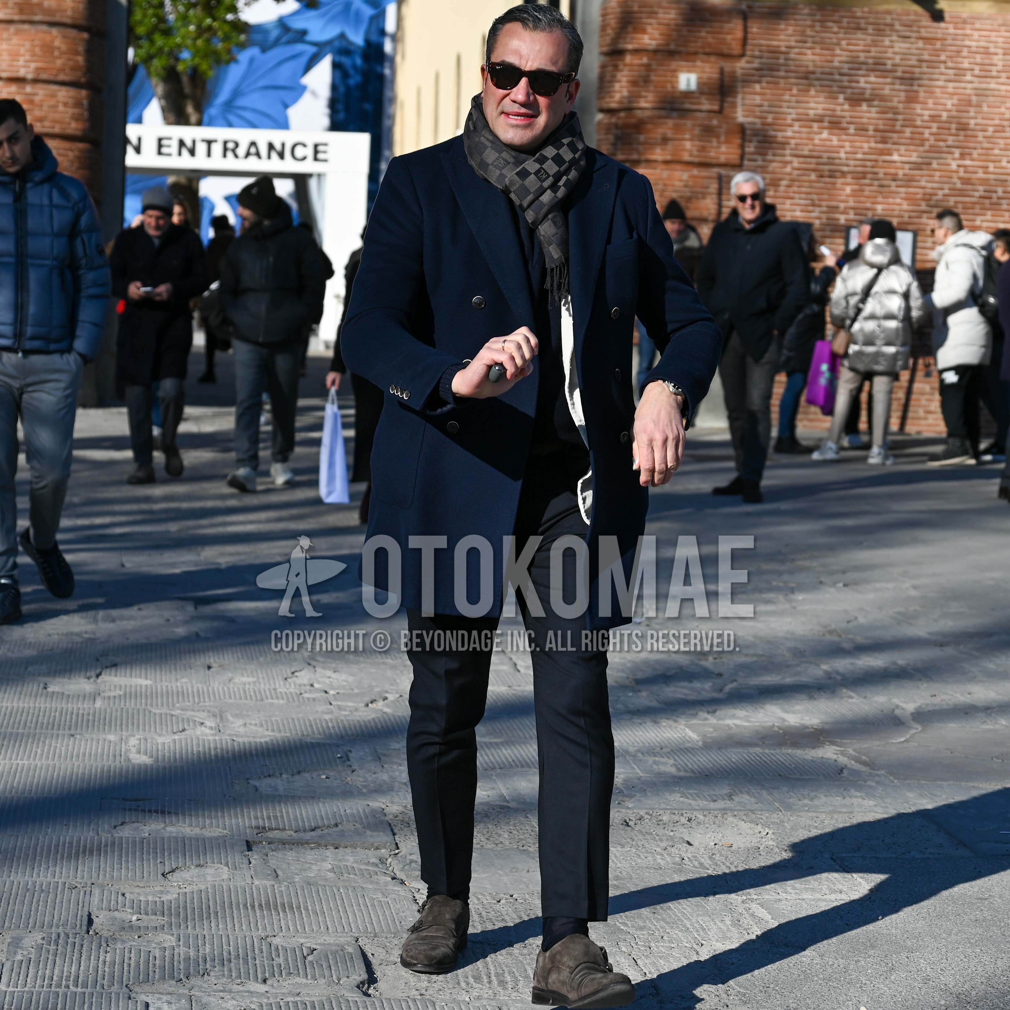 Men's spring autumn winter outfit with black plain sunglasses, gray black check scarf, navy plain tailored jacket, navy plain slacks, black plain socks, gray tassel loafers leather shoes.