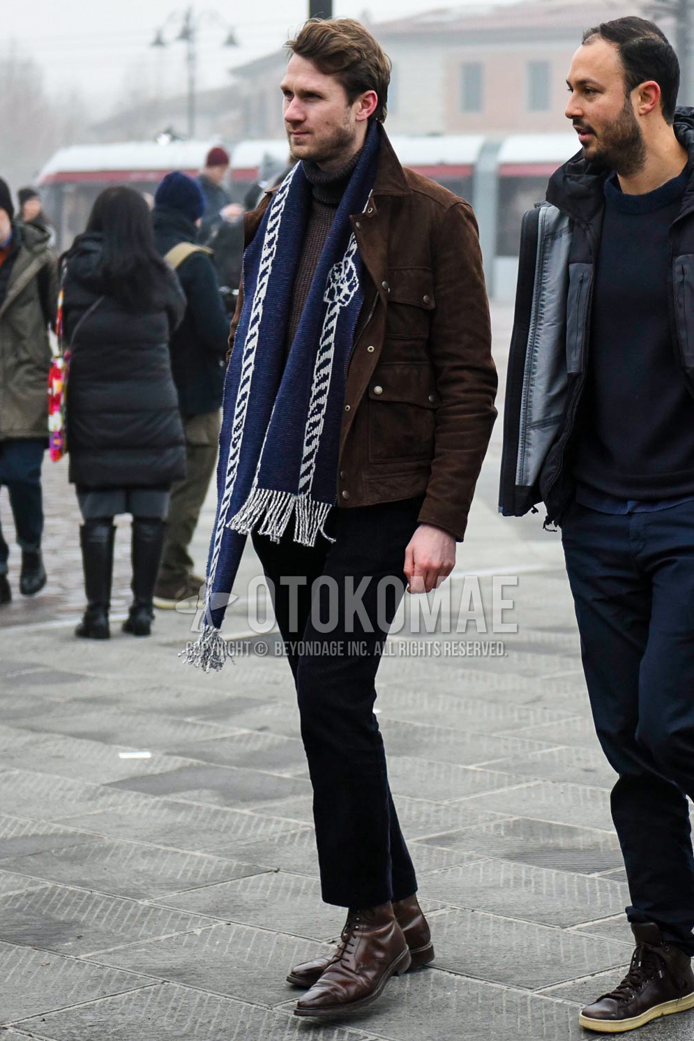 Men's winter outfit with plain leather jacket, brown plain turtleneck knit, black plain winter pants (corduroy,velour), brown  boots.
