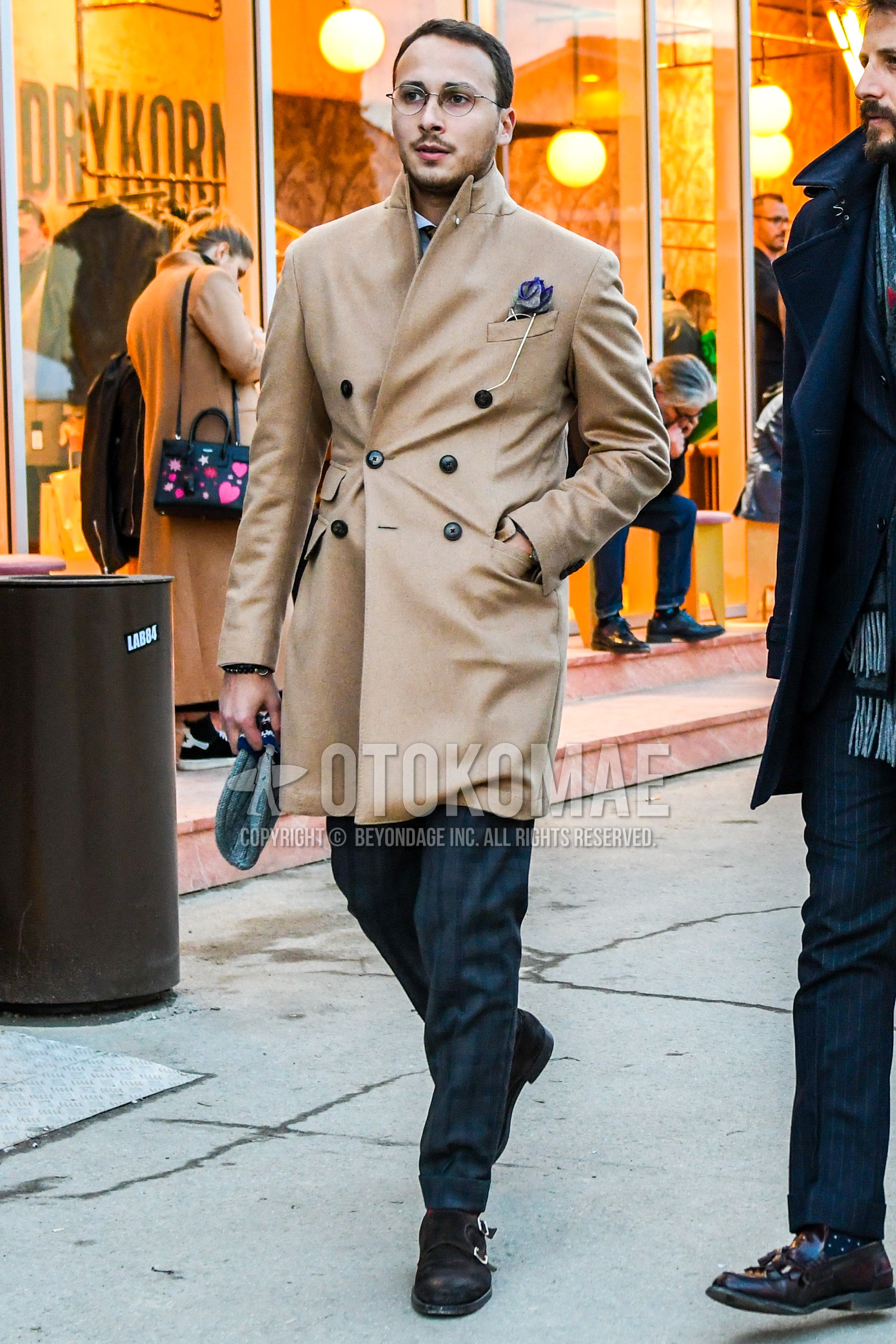 Men's winter outfit with plain glasses, brown plain chester coat, dark gray check slacks, brown monk shoes leather shoes.