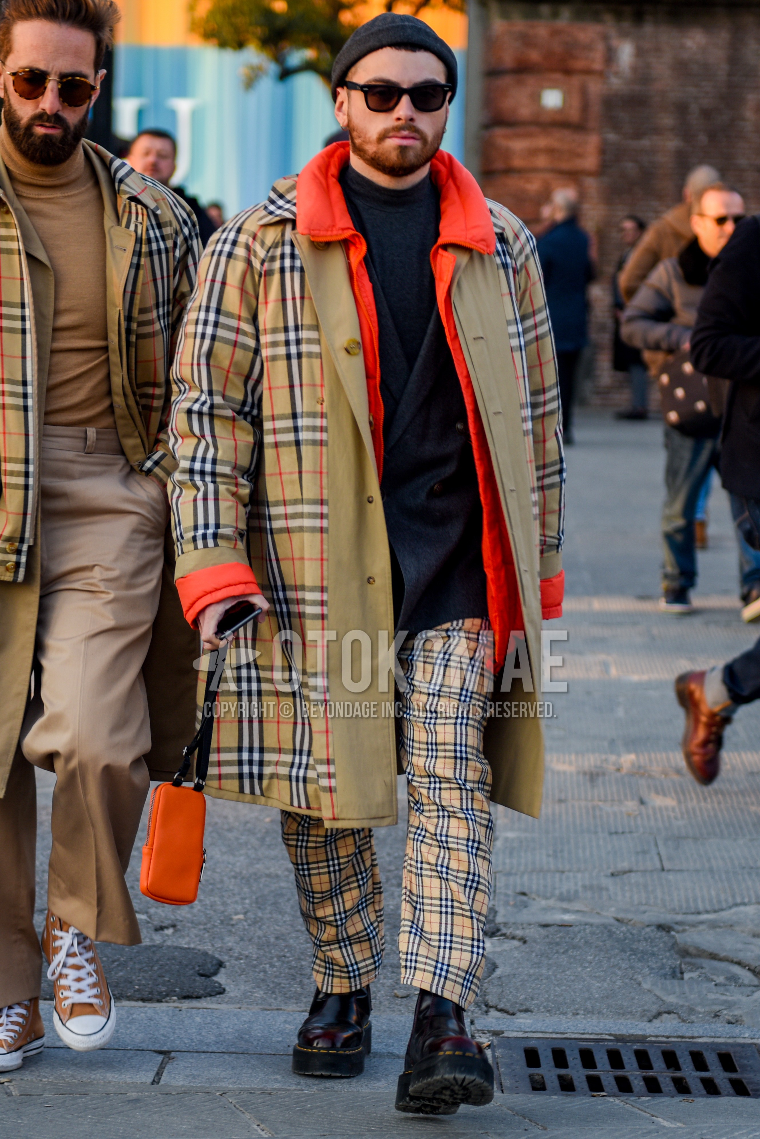 Men's autumn winter outfit with gray plain cap, black plain sunglasses, beige check stenkarrer coat, orange plain inner down, gray plain tailored jacket, gray plain turtleneck knit, beige check slacks, black  boots.