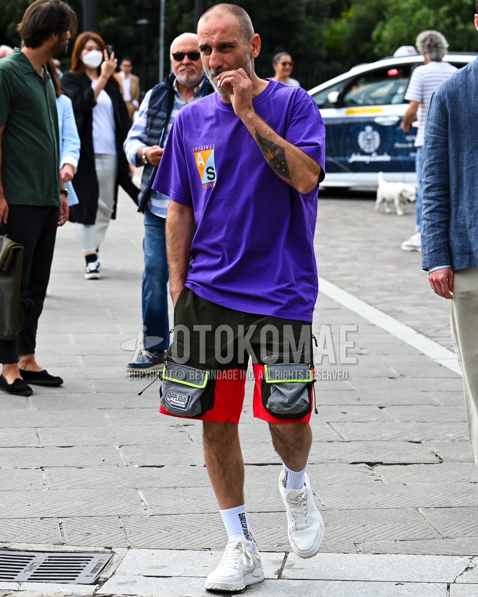 Men's spring summer outfit with purple one point t-shirt, black red bottoms short pants.