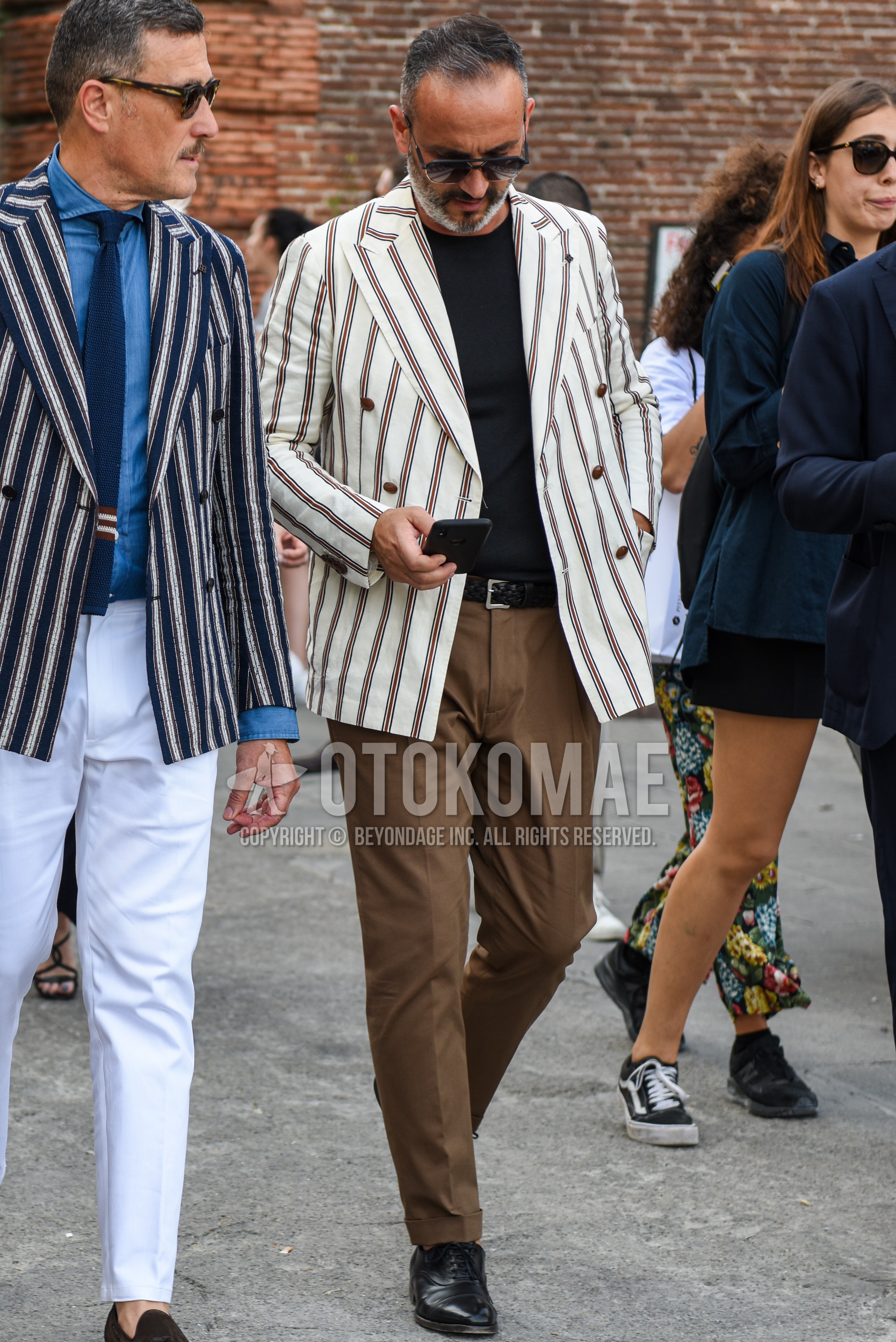 Men's spring summer autumn outfit with black plain sunglasses, white stripes tailored jacket, black plain t-shirt, black plain braided belt, black plain leather belt, brown plain slacks, black straight-tip shoes leather shoes.