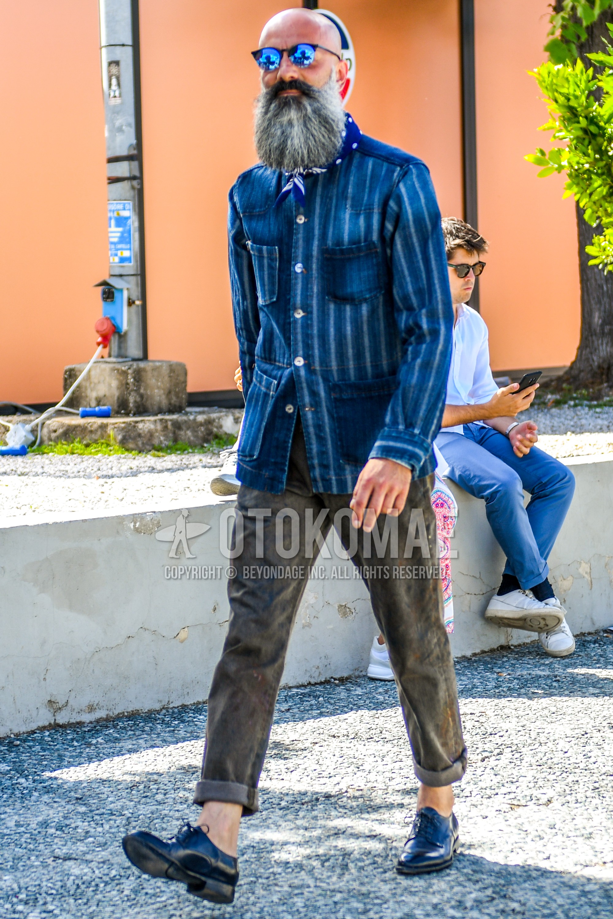 Men's spring summer autumn outfit with plain sunglasses, blue scarf bandana/neckerchief, blue stripes shirt jacket, blue stripes denim jacket, brown plain cotton pants, black plain toe leather shoes.