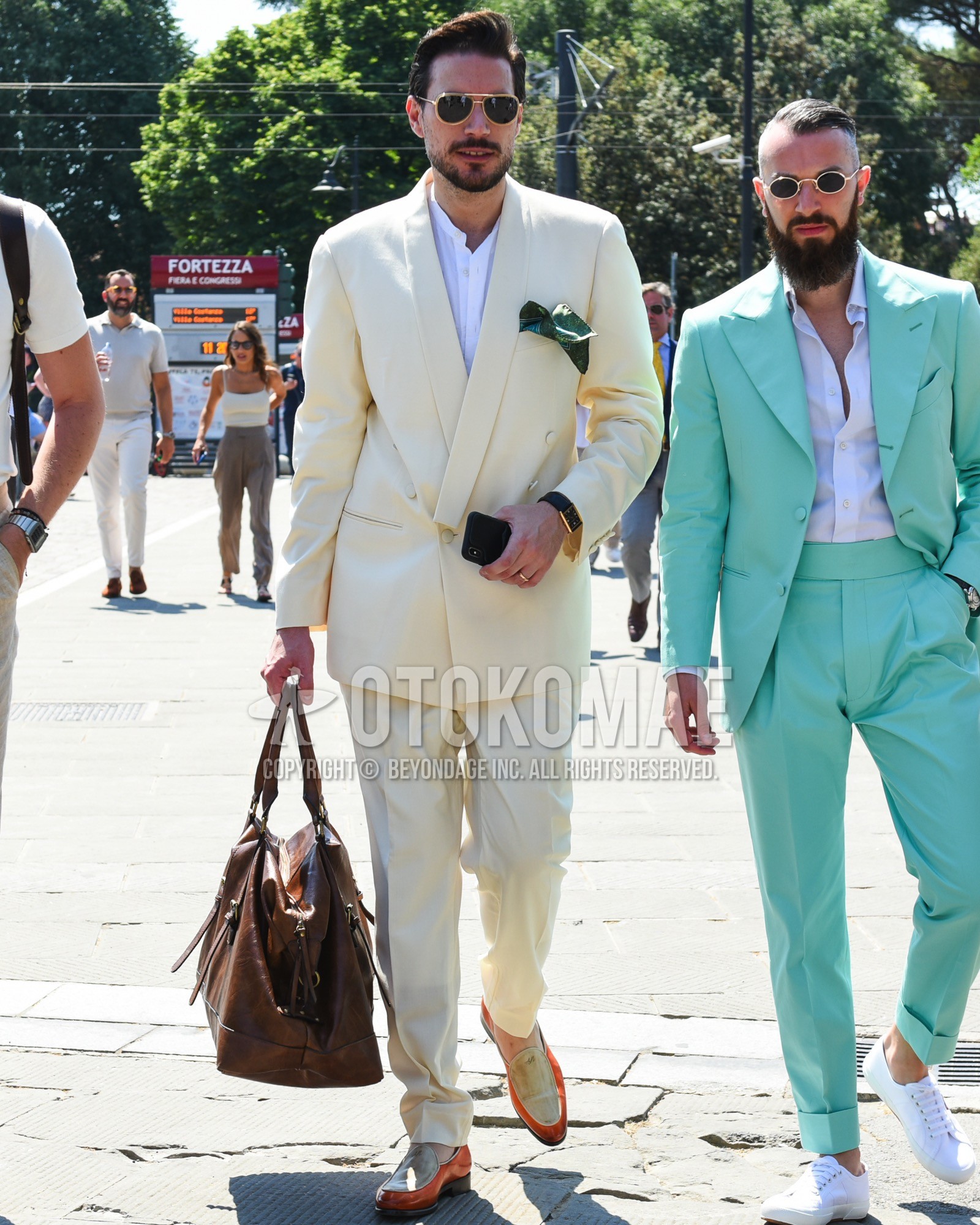 Men's spring summer outfit with gold plain sunglasses, white plain shirt, white orange  loafers leather shoes, brown plain boston bag, white plain suit.