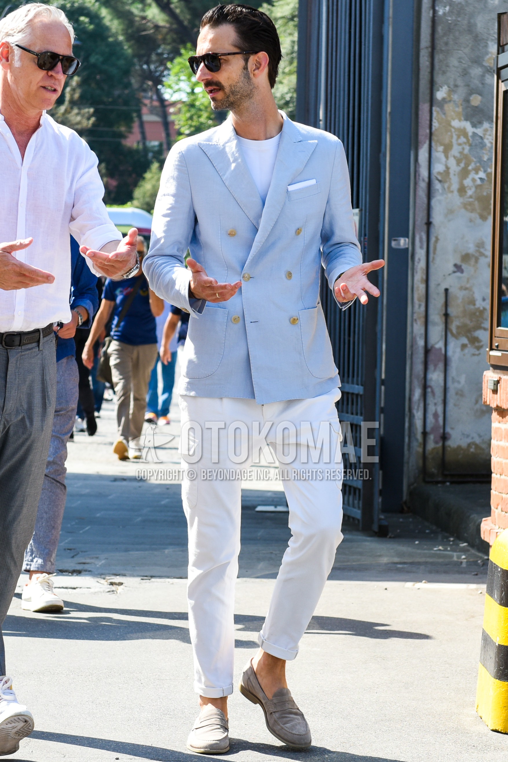 Men's spring summer outfit with brown tortoiseshell sunglasses, light blue plain tailored jacket, white plain t-shirt, white plain cargo pants, gray coin loafers leather shoes.