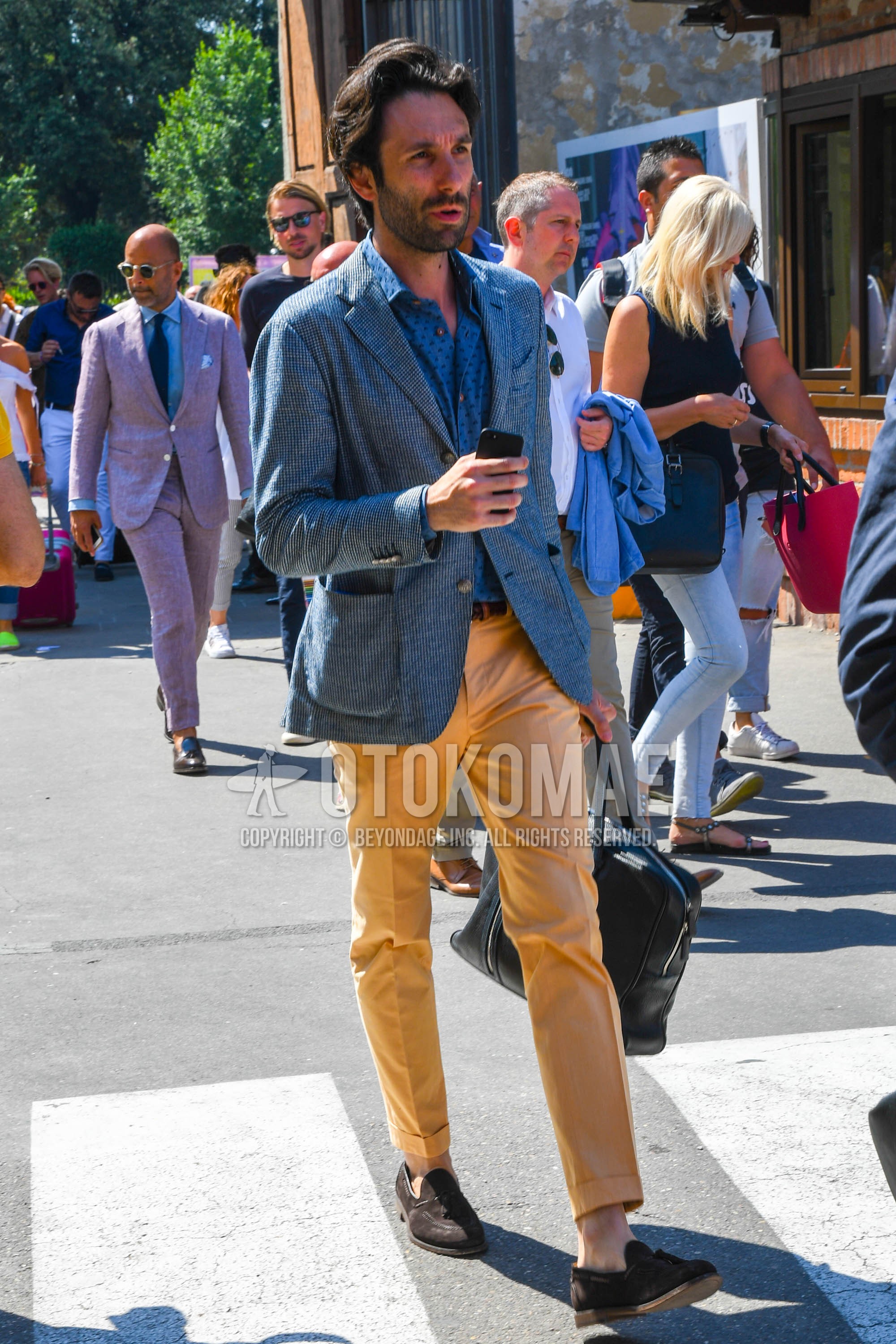 Men's spring summer autumn outfit with blue plain tailored jacket, blue dots shirt, orange plain slacks, brown tassel loafers leather shoes, brown suede shoes leather shoes.