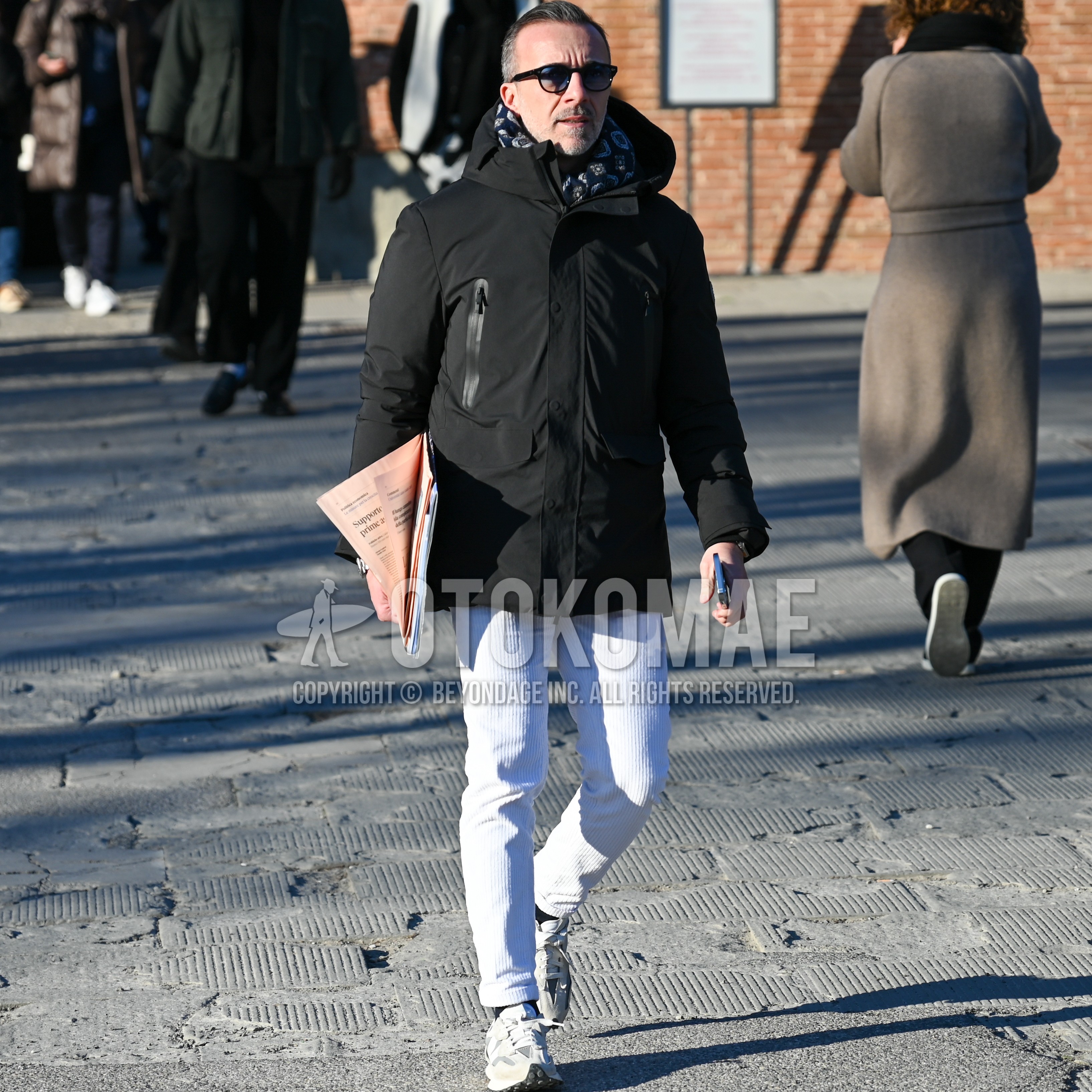 Men's winter outfit with black plain sunglasses, black plain down jacket, white plain winter pants (corduroy,velour), black plain socks, gray low-cut sneakers.