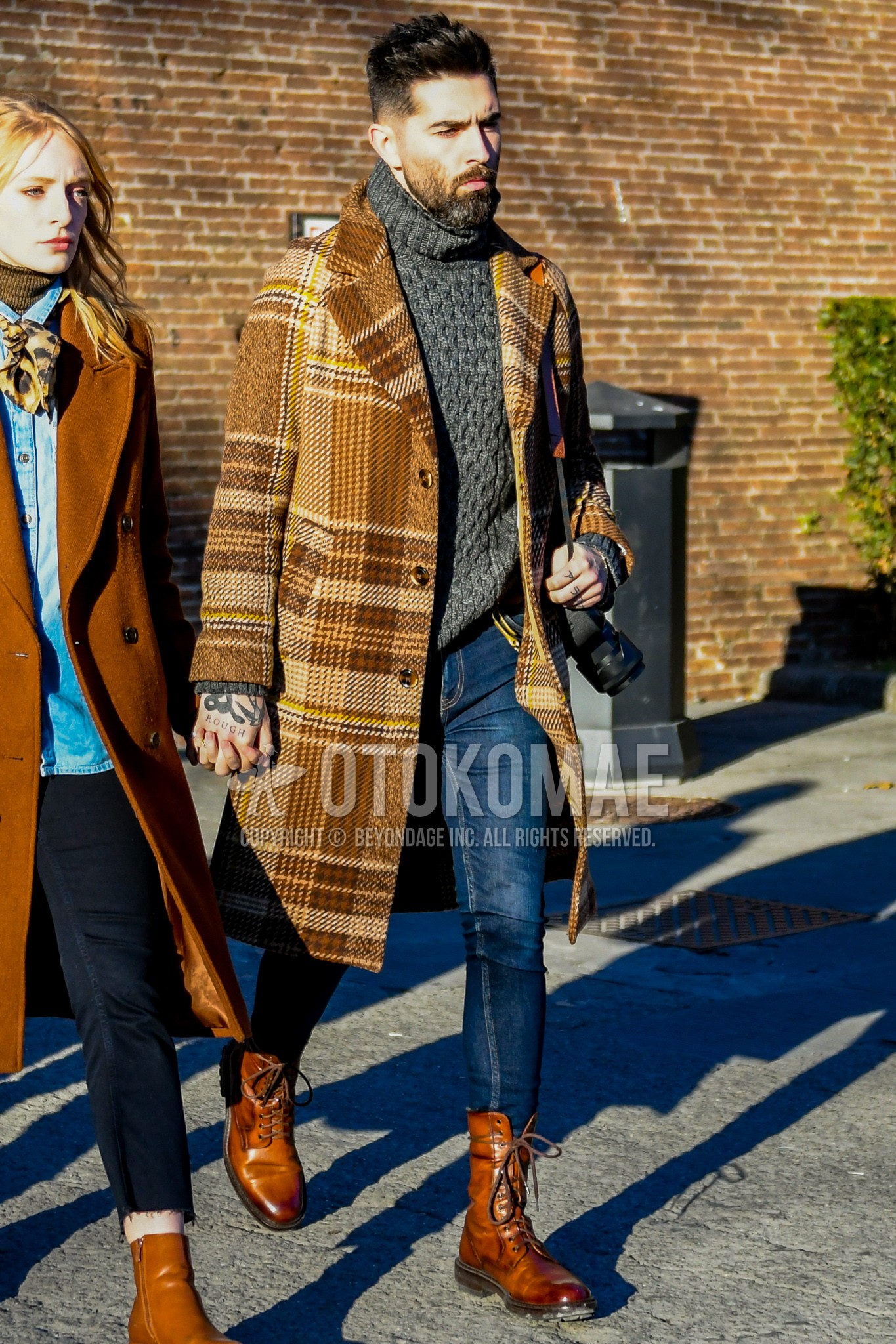 Men's winter outfit with brown check chester coat, dark gray plain turtleneck knit, navy plain denim/jeans, brown  boots.