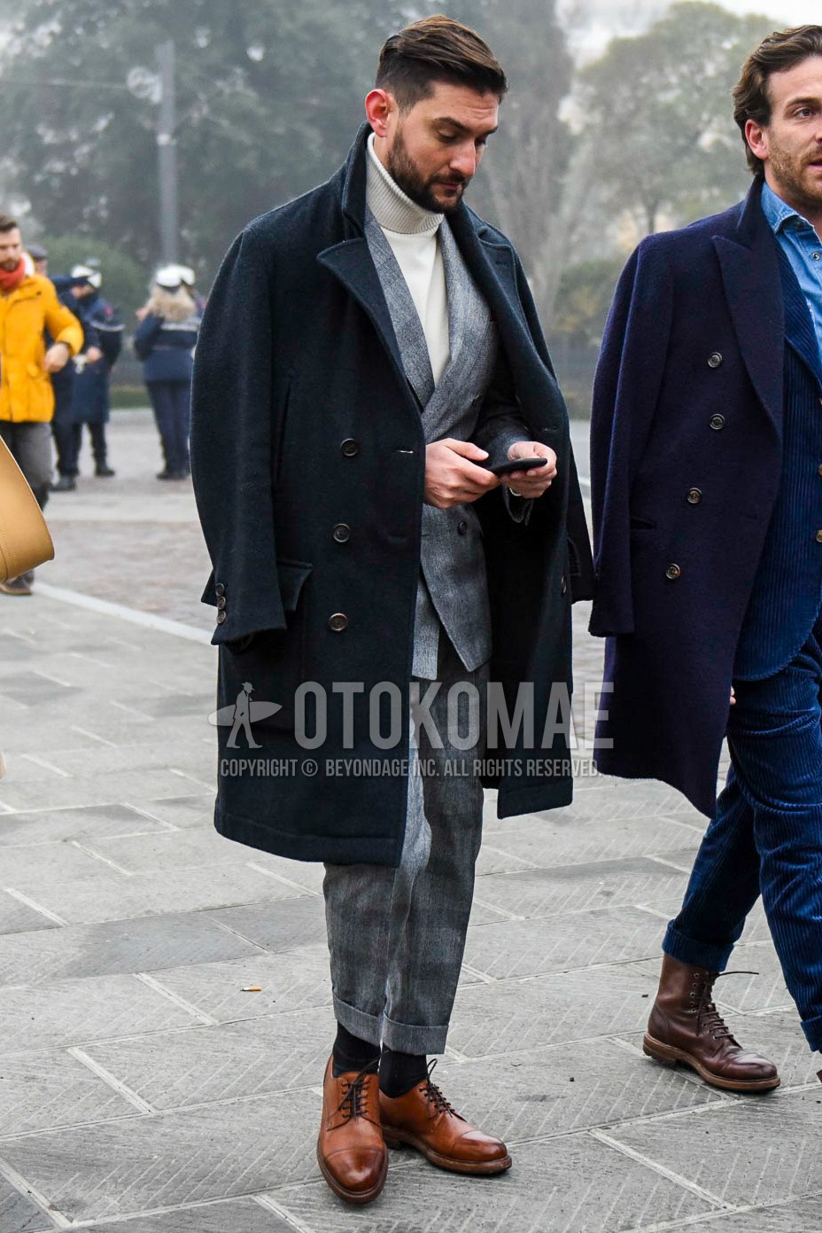 Men's winter outfit with black plain ulster coat, white plain turtleneck knit, dark gray plain socks, brown straight-tip shoes leather shoes, gray check suit.