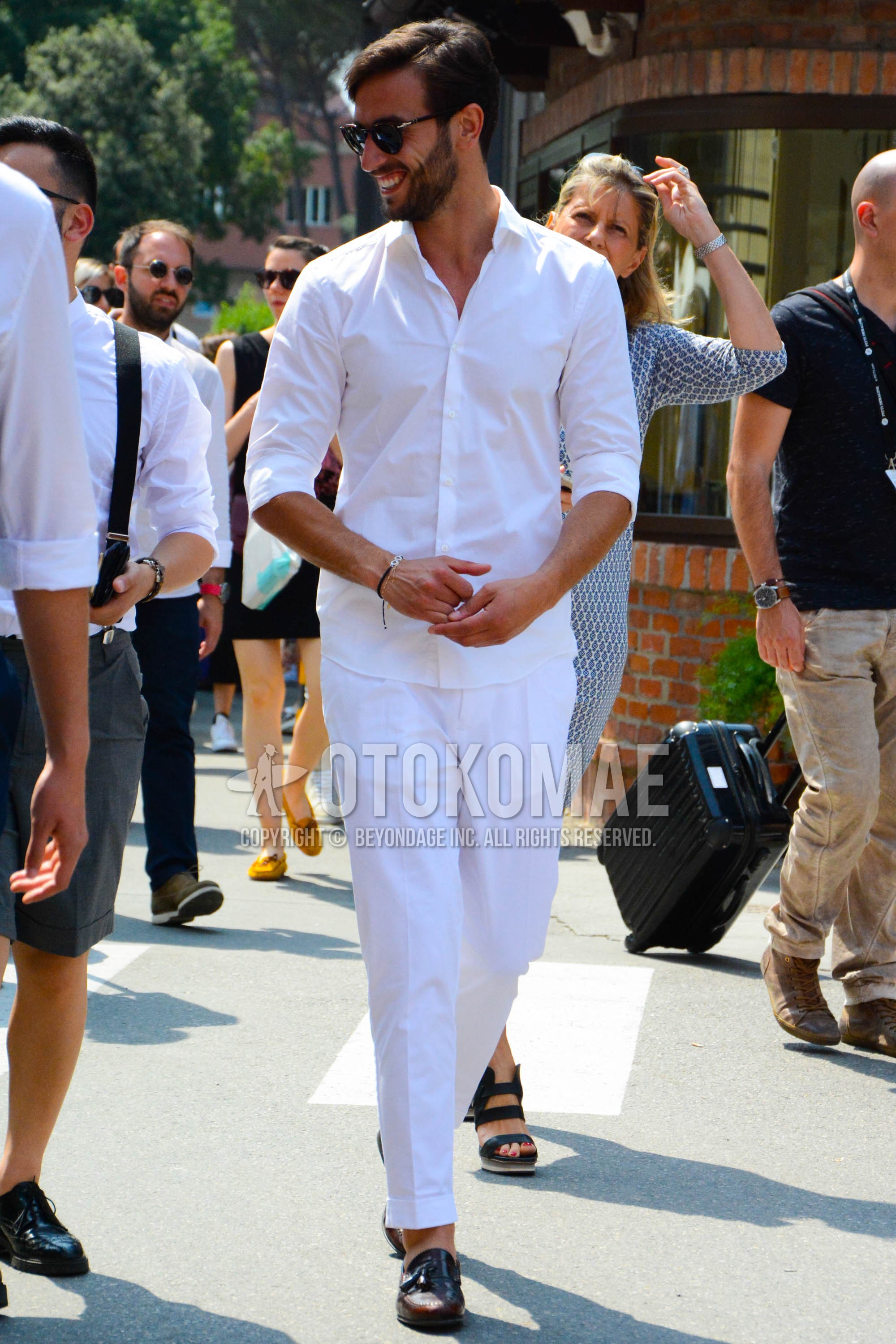 Men's spring summer outfit with plain sunglasses, white plain shirt, white plain cotton pants, brown tassel loafers leather shoes.