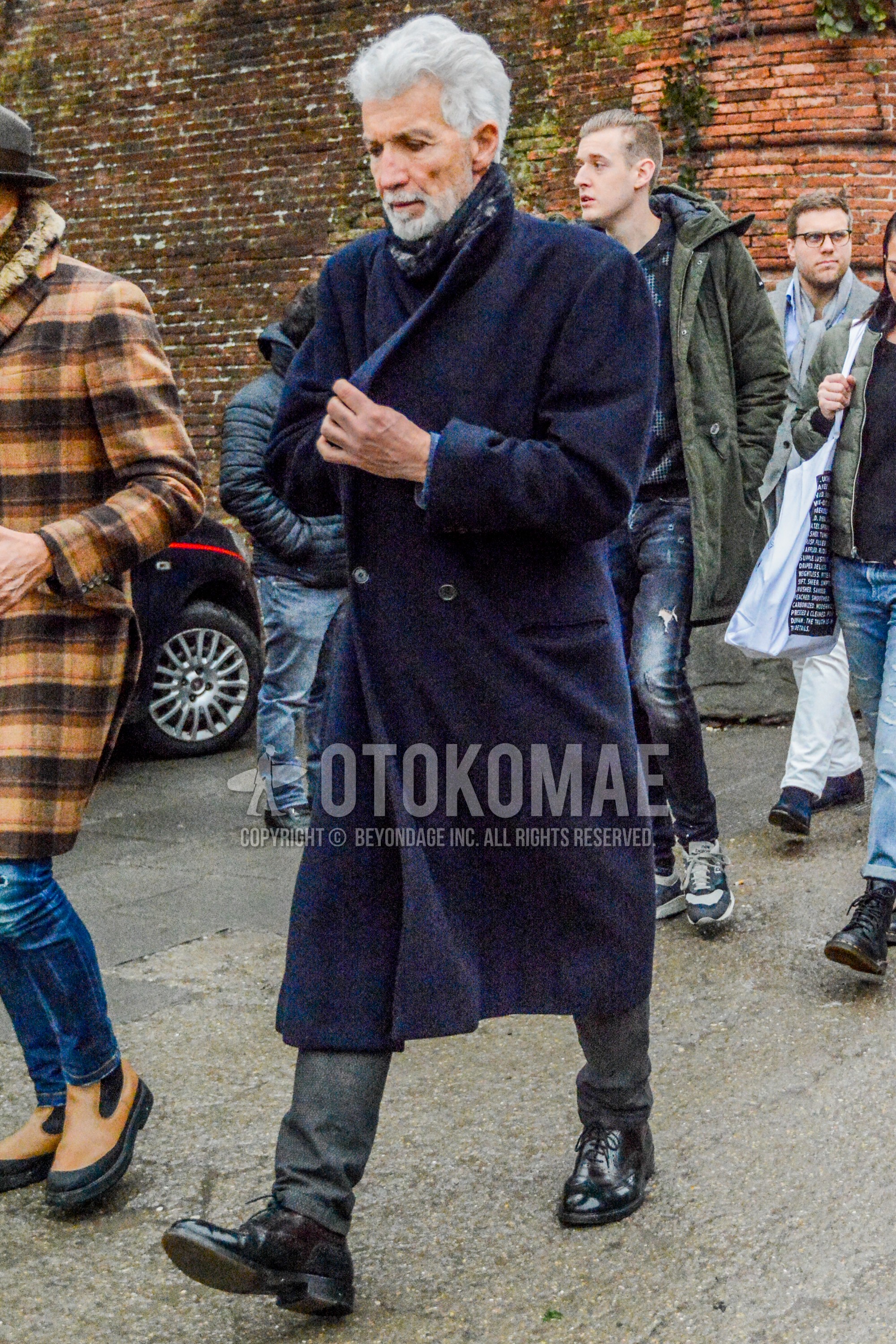 Men's winter outfit with navy plain scarf, navy plain chester coat, dark gray plain ankle pants, navy wing-tip shoes leather shoes.