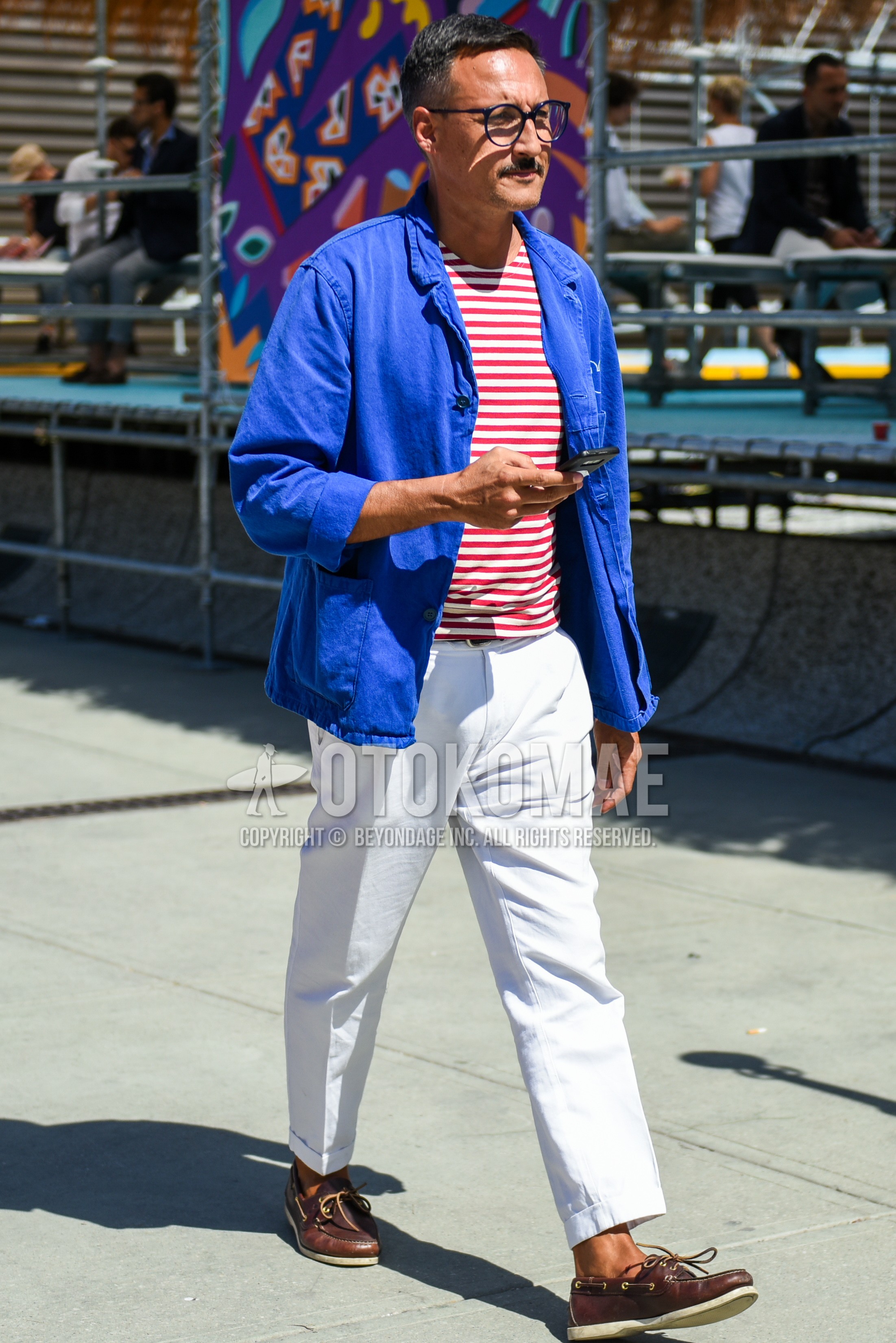 Men's spring summer autumn outfit with blue plain glasses, blue plain tailored jacket, white red horizontal stripes t-shirt, white plain cotton pants, brown moccasins/deck shoes leather shoes.