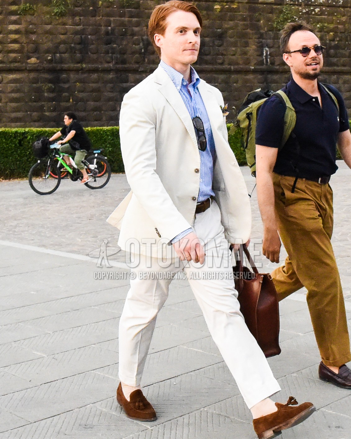 Men's spring summer autumn outfit with navy white plain shirt, brown plain leather belt, brown tassel loafers leather shoes, brown suede shoes leather shoes, brown plain briefcase/handbag, white plain suit.