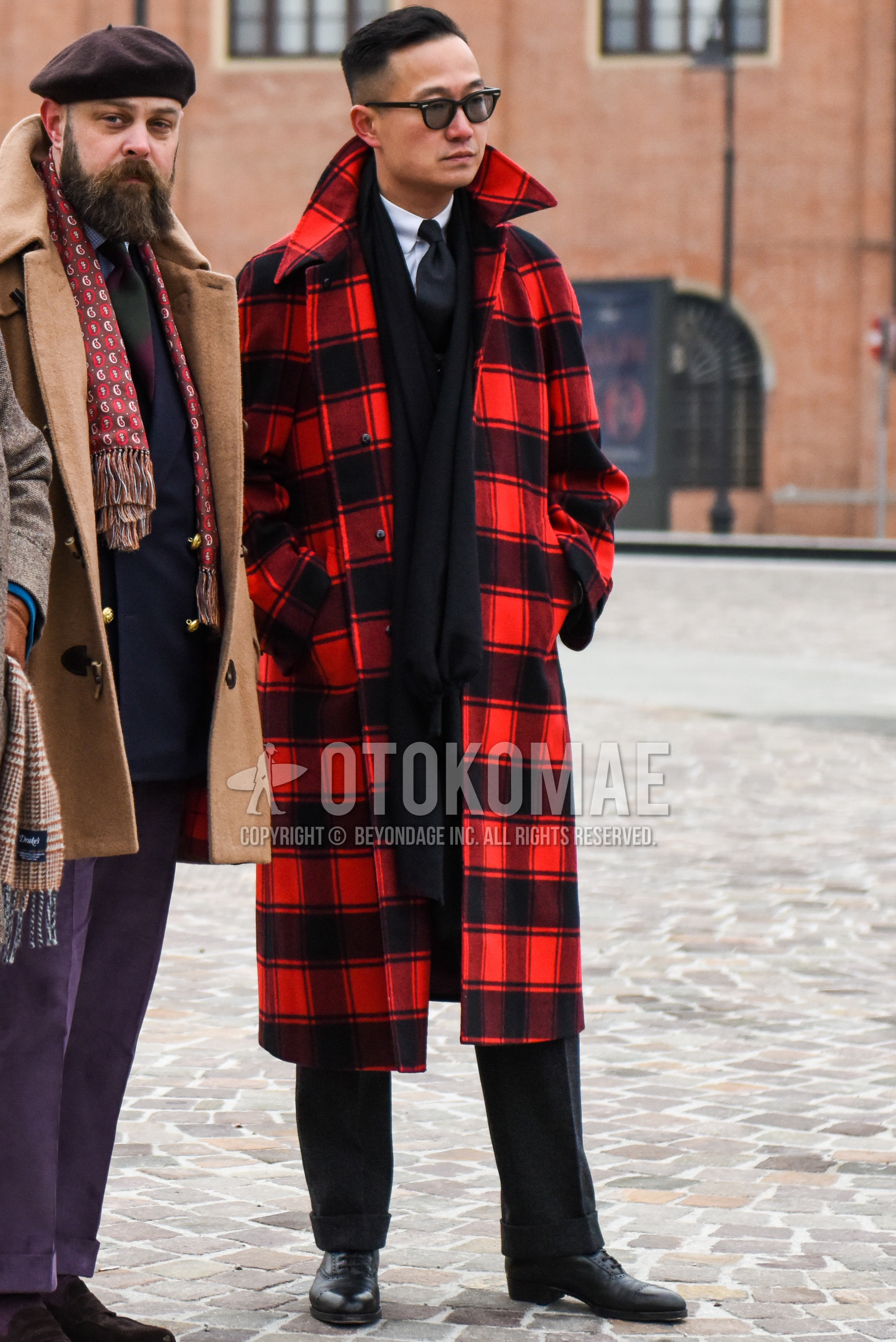 Men's winter outfit with plain sunglasses, black plain scarf, black plain slacks, black brogue shoes leather shoes.