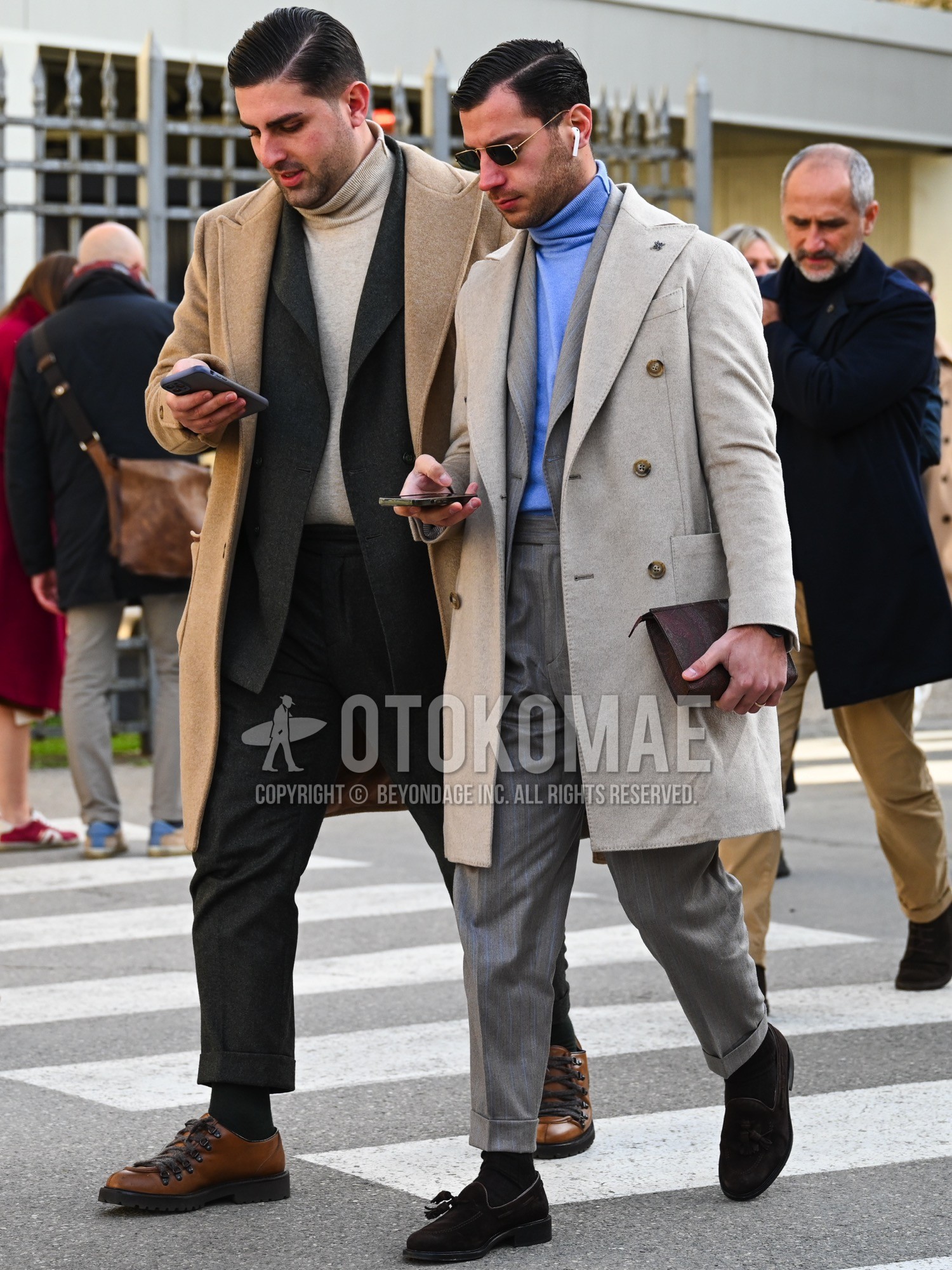 Men's autumn winter outfit with gold plain sunglasses, white plain chester coat, blue plain turtleneck knit, black plain socks, brown tassel loafers leather shoes, gray plain suit.