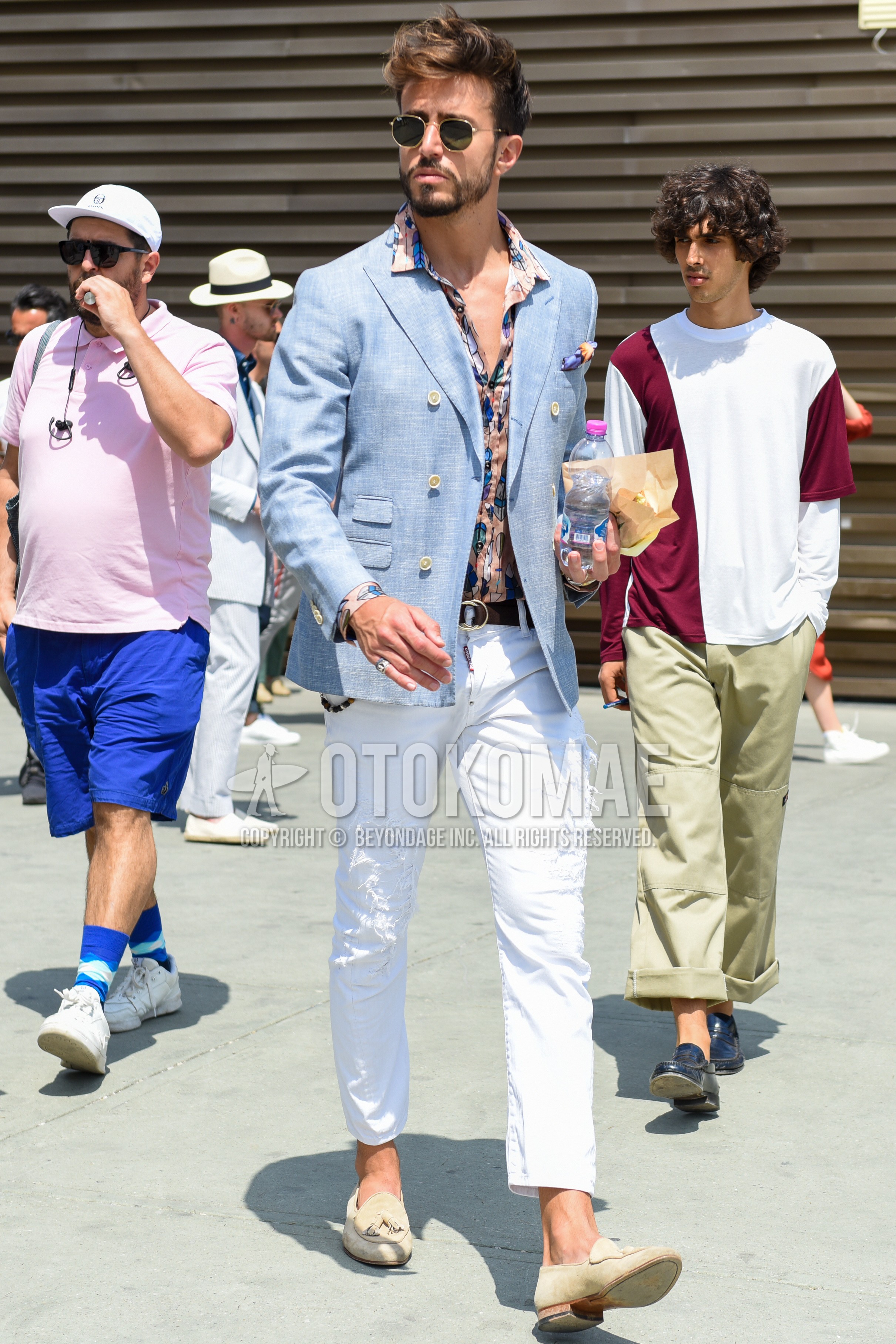 Men's spring summer autumn outfit with silver black plain sunglasses, light blue plain tailored jacket, multi-color tops/innerwear shirt, white plain damaged jeans, beige tassel loafers leather shoes.