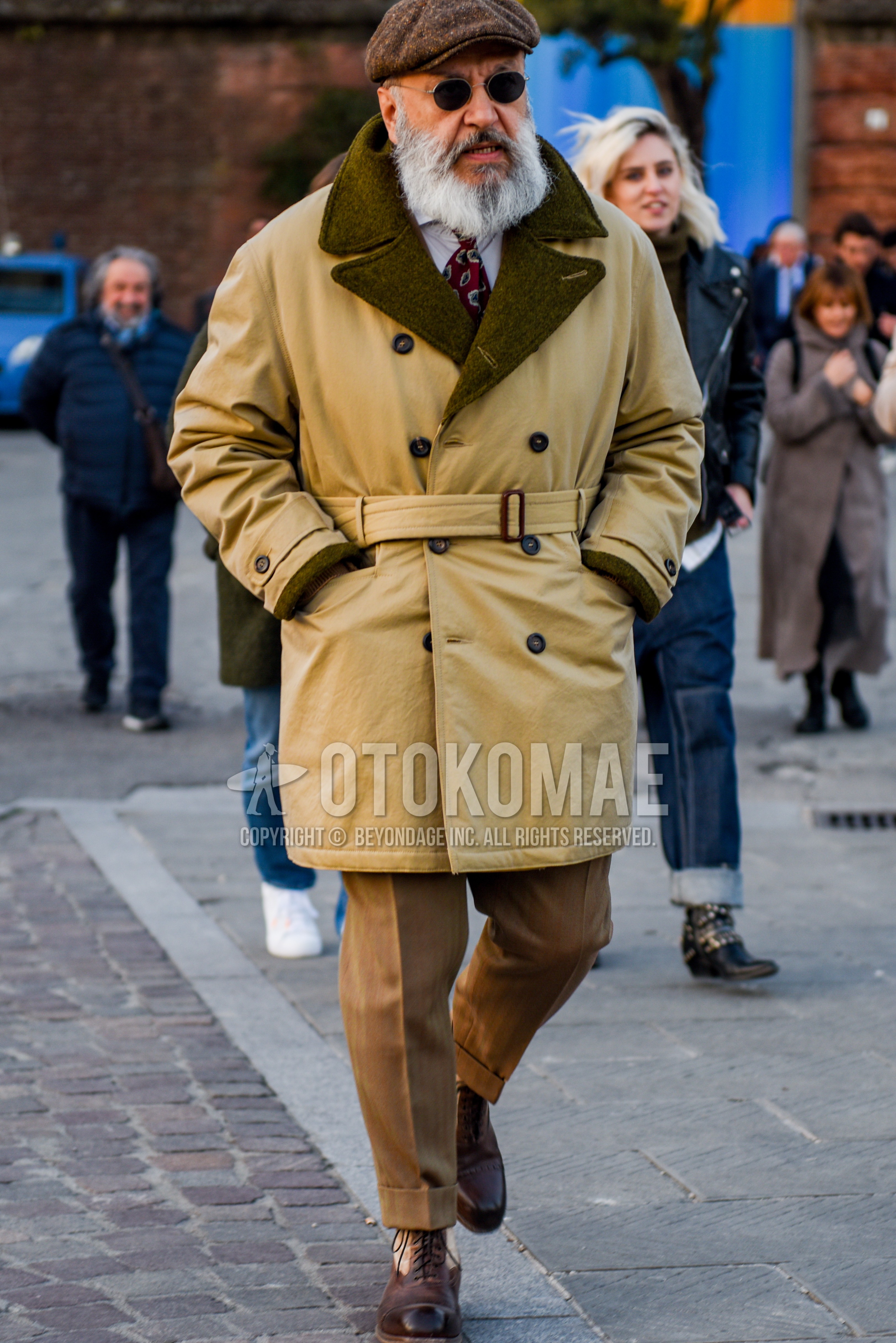 Men's autumn winter outfit with brown plain hunting cap, silver plain sunglasses, beige plain chester coat, white plain shirt, beige plain slacks, beige plain cropped pants, brown  boots, red small crest necktie.