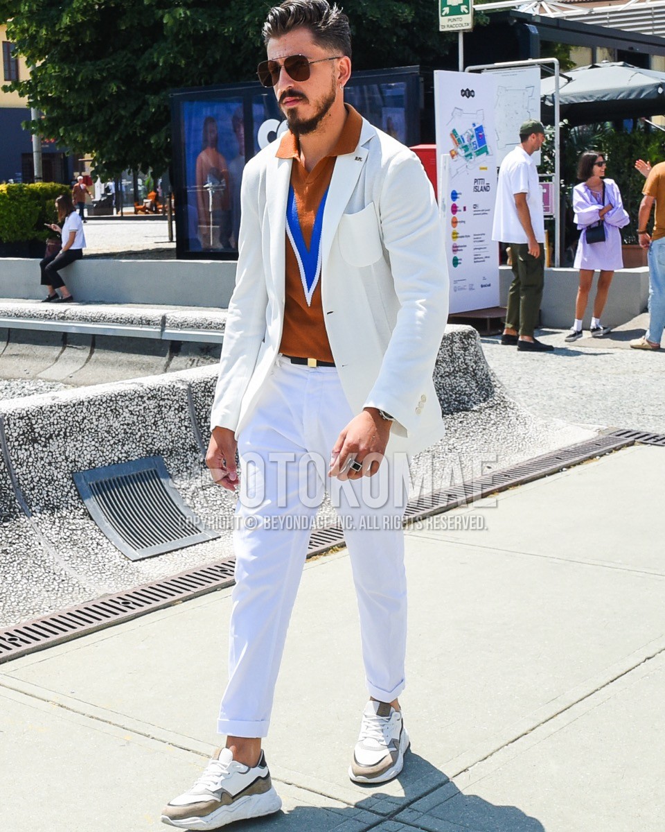 Men's spring summer outfit with silver plain sunglasses, white plain tailored jacket, brown tops/innerwear t-shirt, black plain leather belt, white plain cotton pants, white low-cut sneakers.