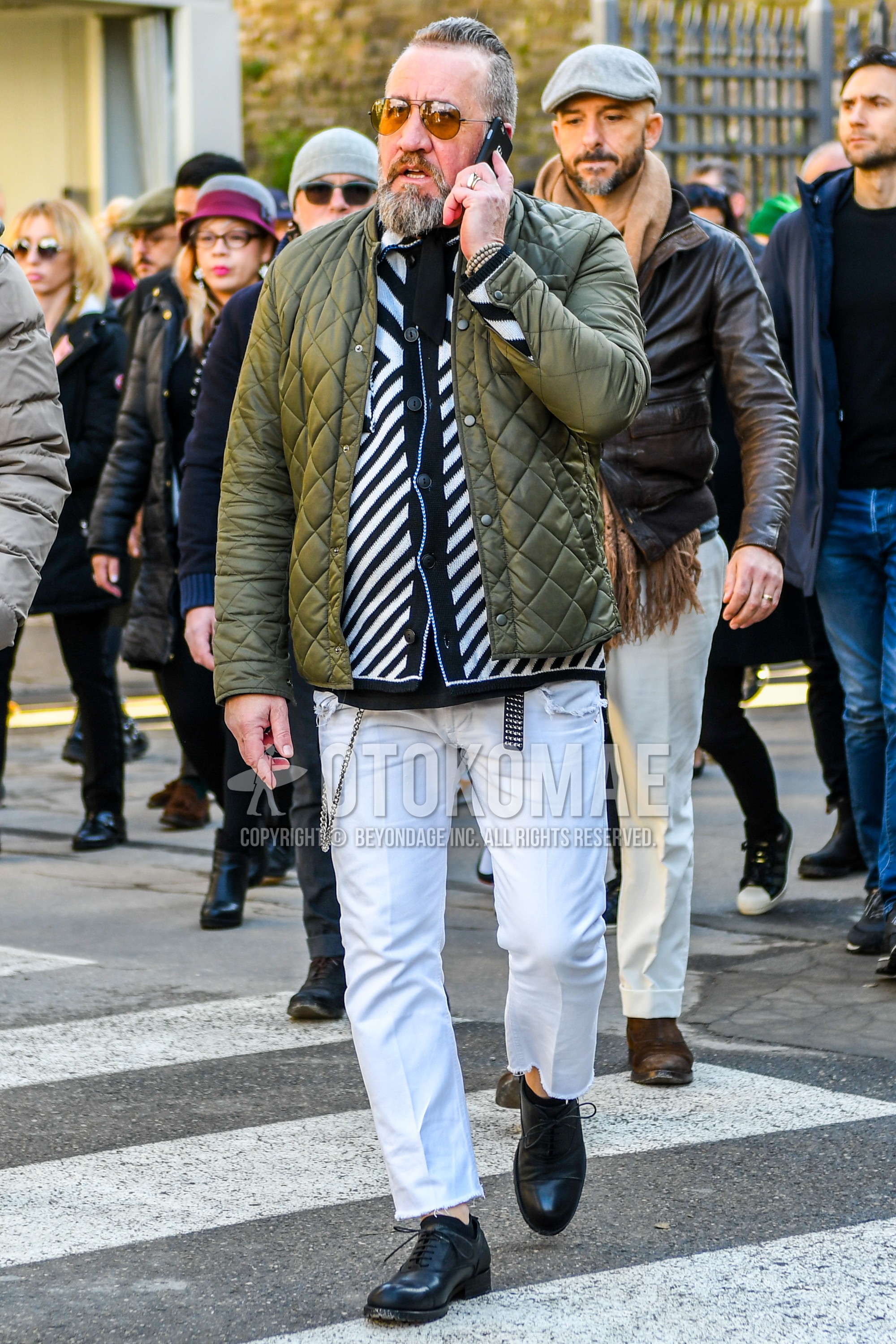Men's winter outfit with plain sunglasses, plain quilted jacket, white black horizontal stripes cardigan, white plain ankle pants, white plain cotton pants, black plain toe leather shoes.