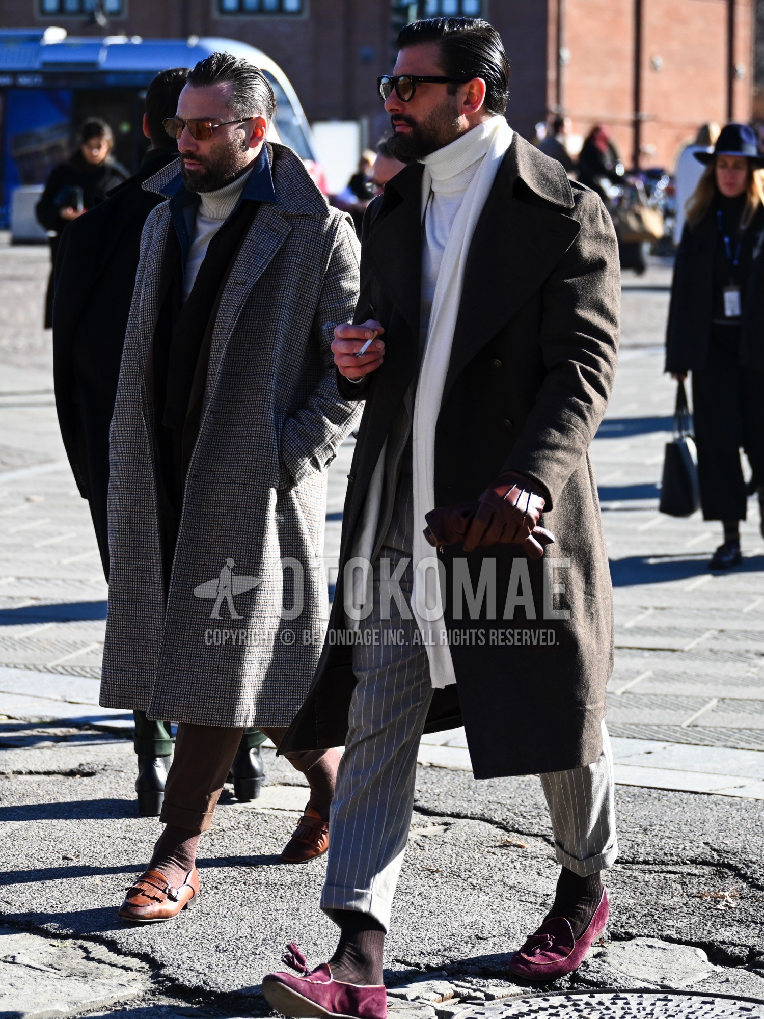 Men's autumn winter outfit with black plain sunglasses, white plain scarf, dark gray plain trench coat, white plain turtleneck knit, brown plain socks, red tassel loafers leather shoes, red suede shoes leather shoes, gray stripes suit.