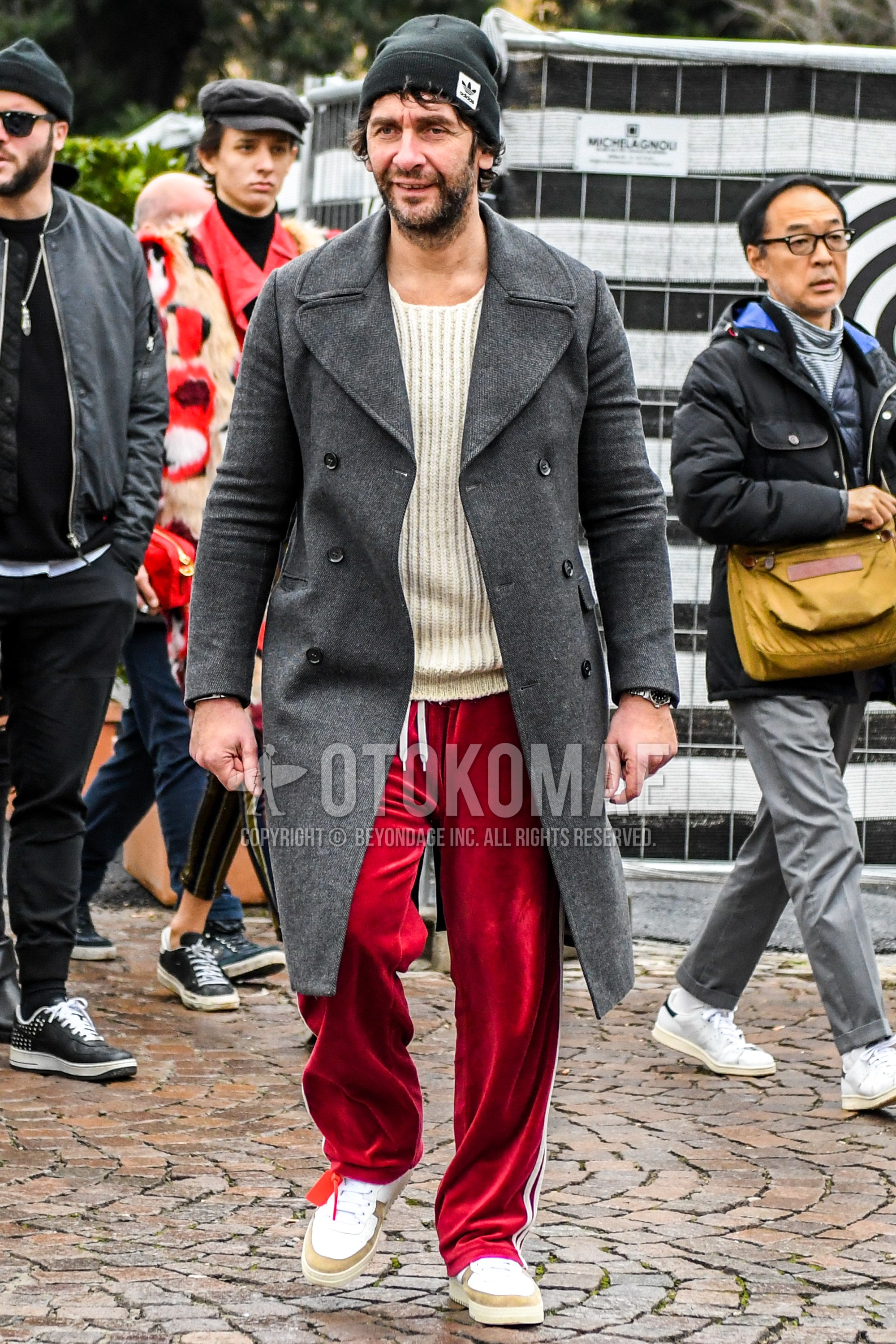 Men's autumn winter outfit with plain knit cap, gray plain ulster coat, white plain sweater, red plain sideline pants, plain winter pants (corduroy,velour), white low-cut sneakers.