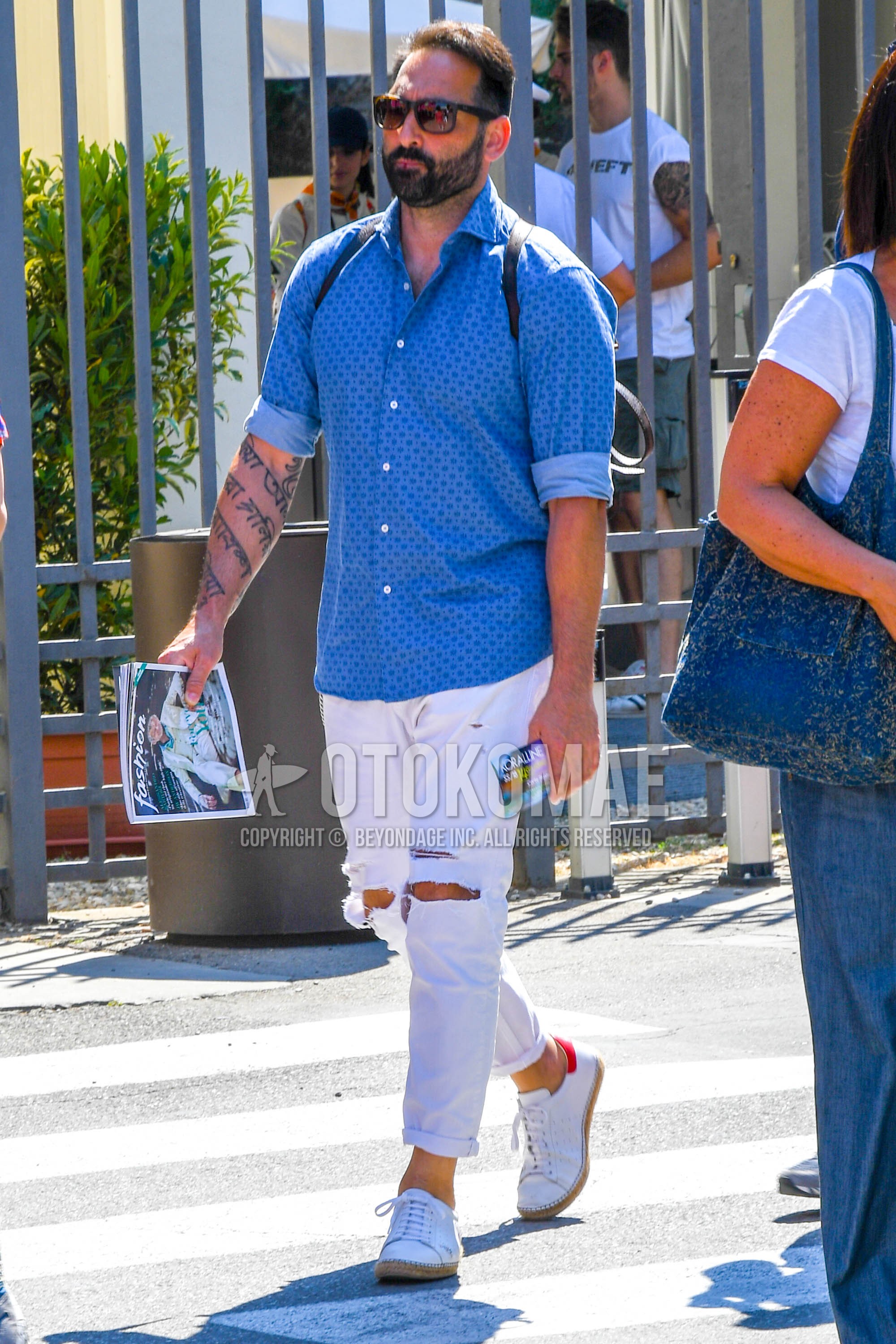 Men's summer outfit with plain sunglasses, blue light blue tops/innerwear shirt, white plain damaged jeans, white plain espadrille.