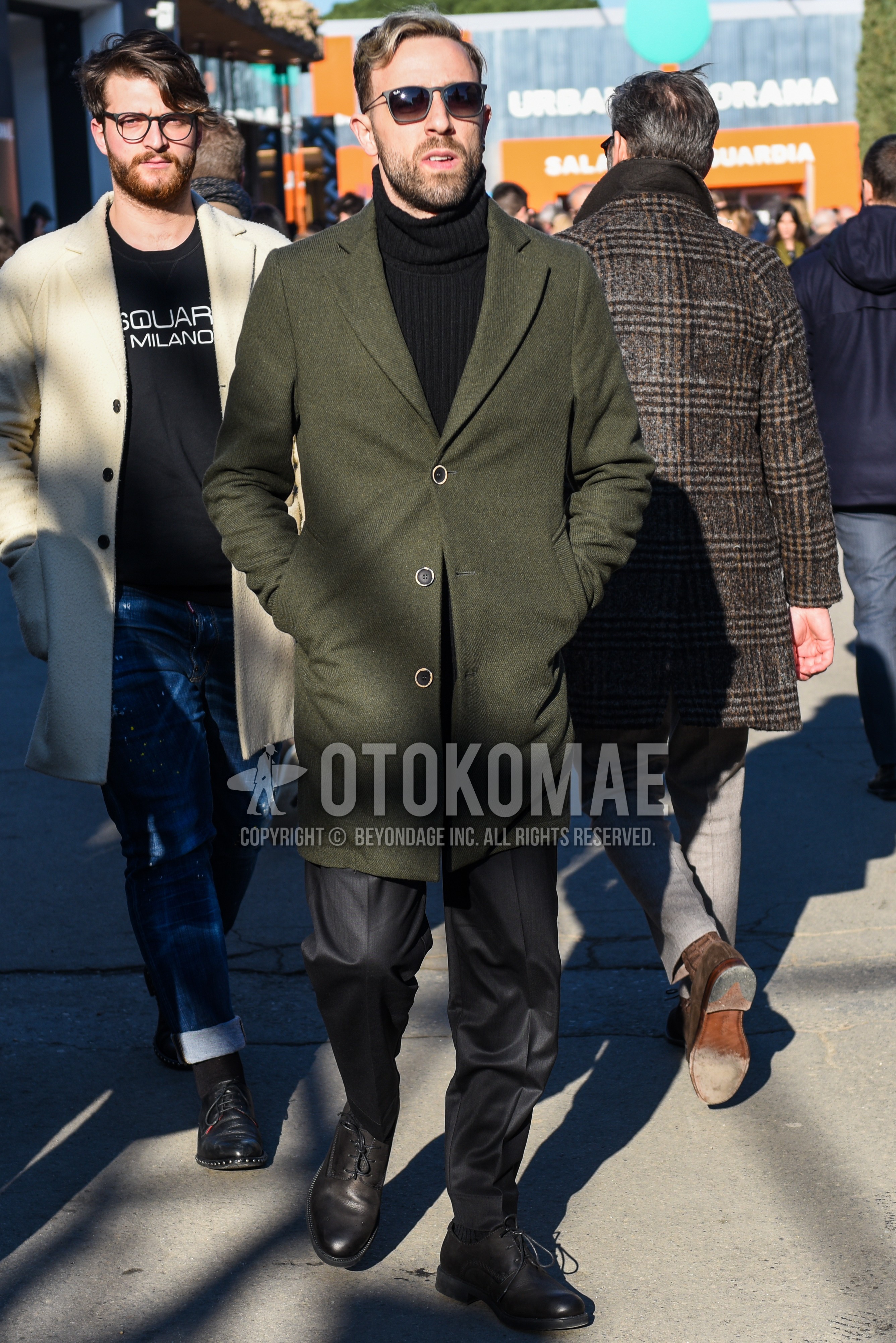 Men's autumn winter outfit with gray plain sunglasses, olive green plain chester coat, black plain turtleneck knit, gray plain slacks, black plain toe leather shoes.
