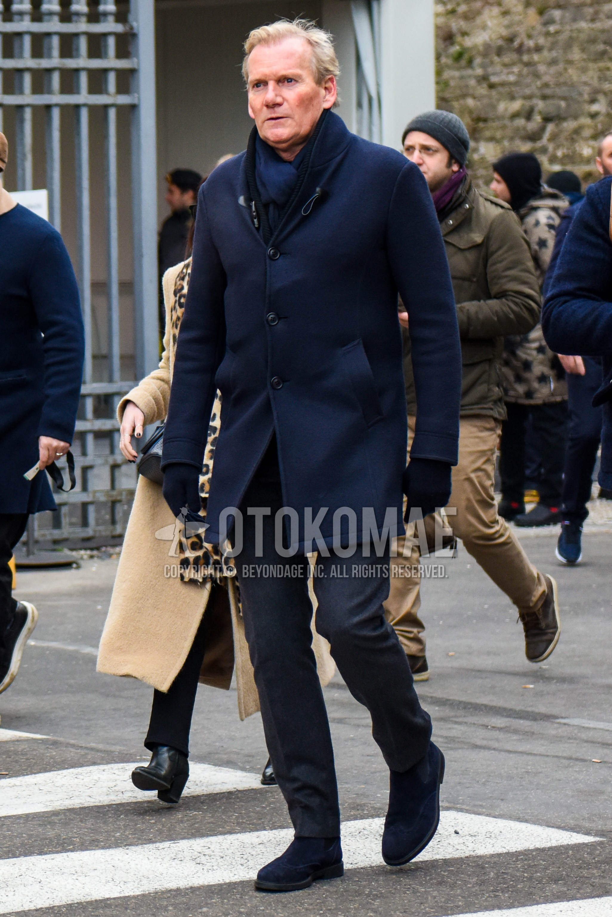 Men's winter outfit with navy plain scarf, navy plain chester coat, gray plain slacks, navy  boots, suede shoes leather shoes.